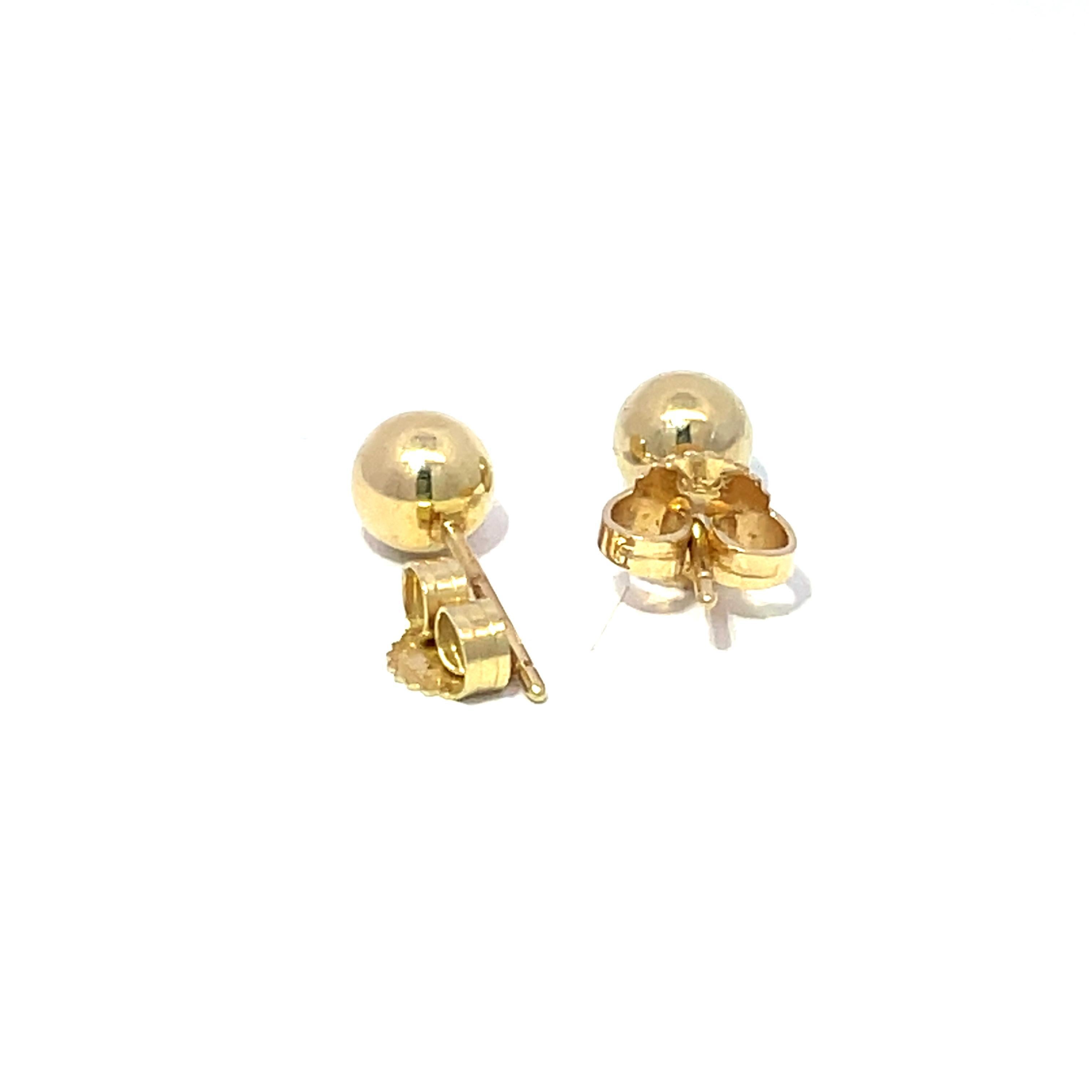 Pendientes Tiffany & Co. de oro amarillo de 18 quilates con bola de cuentas Moderno en venta