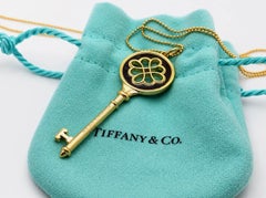 Tiffany & Co 18K Yellow Gold Black Enamel Knot Key Pendant