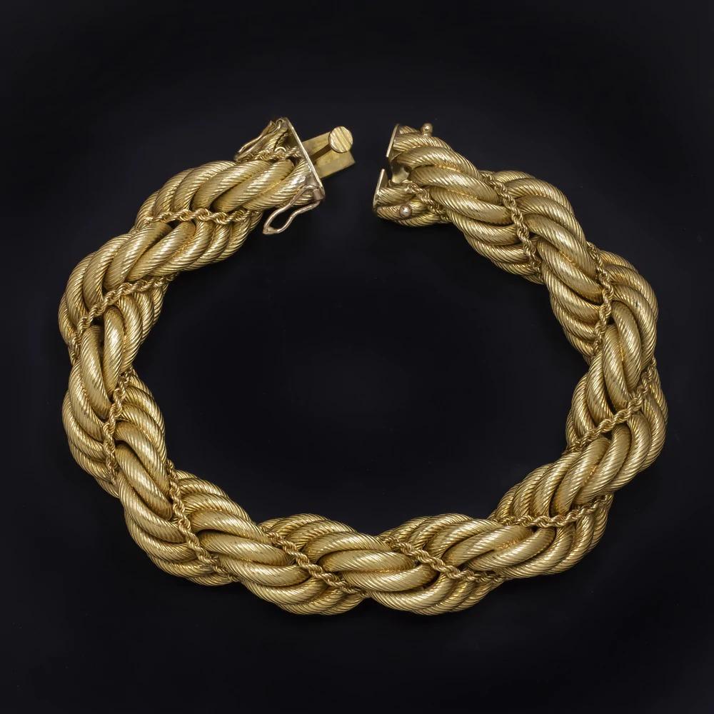  Tiffany & Co 18k yellow gold bracelet has a substantial and luxurious look! The bracelet was crafted in the 1960s-1970s with a beautifully executed double rope design. It bears the Tiffany & Co hallmark! The piece is in excellent condition and is