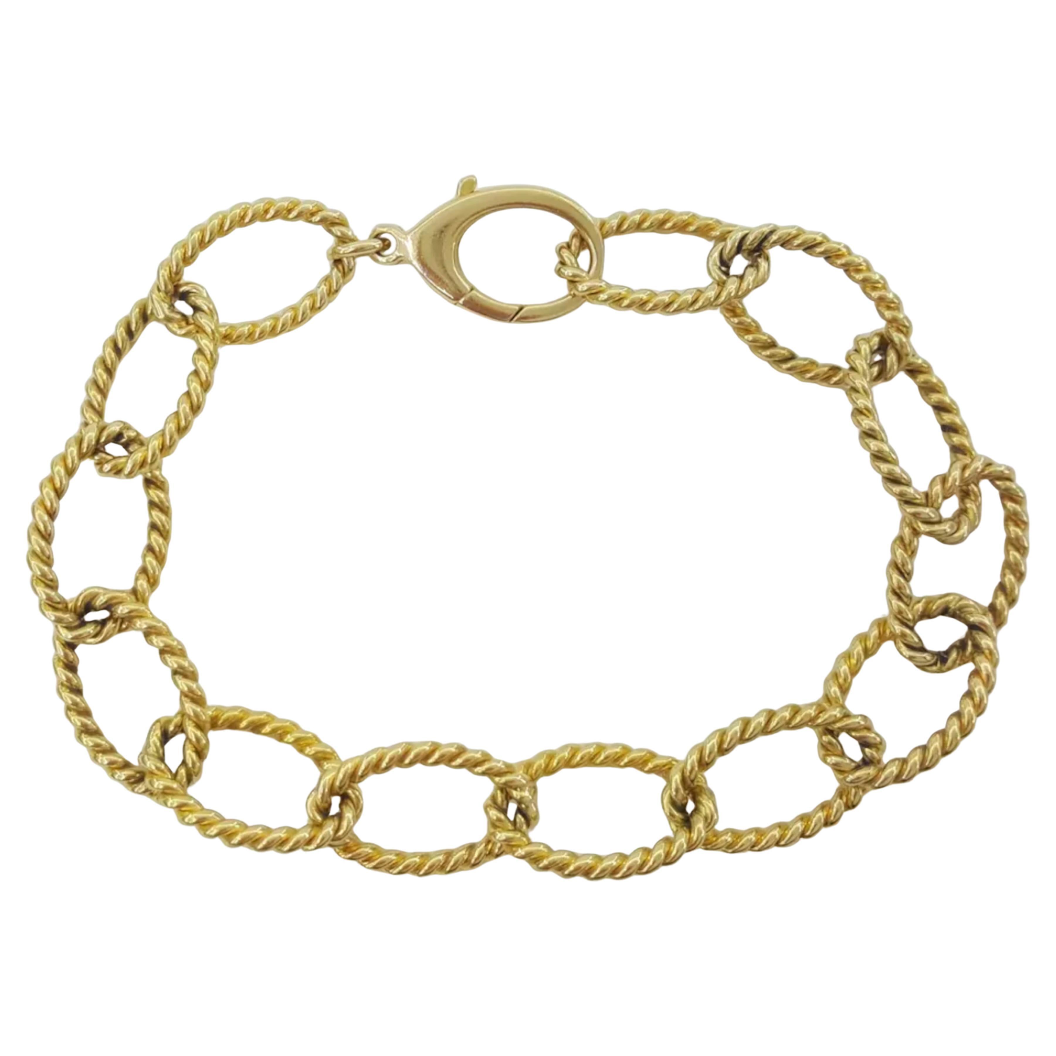 Tiffany & Co. 18k Gelbgold geflochtenes ovales Gliederarmband. Das Armband wiegt 28