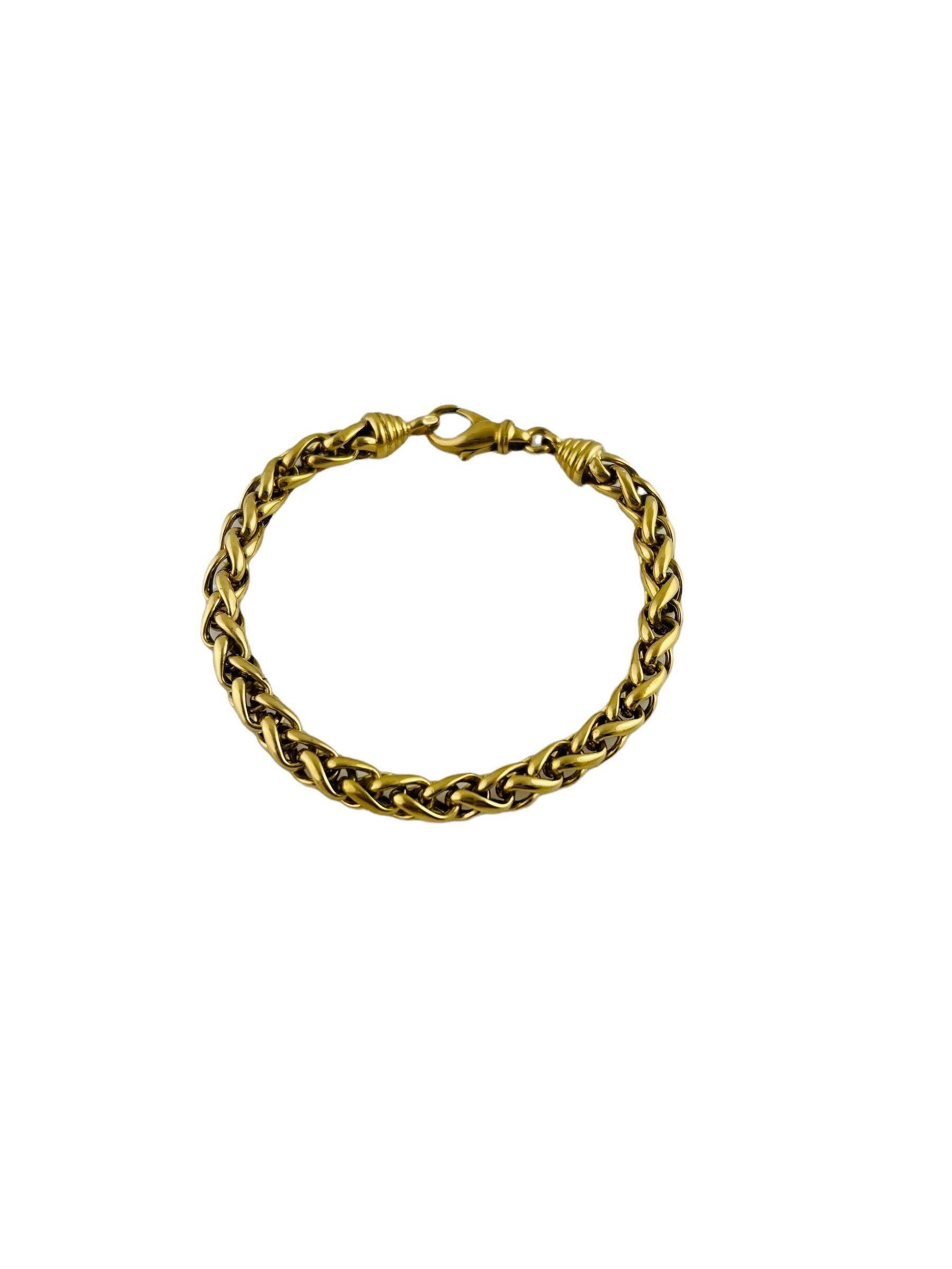 Tiffany & Co. 18K Yellow Gold Braided Wheat Bracelet

This Tiffany & Co. wheat chain bracelet is set in 18K yellow gold.

This bracelet is approx. 8
