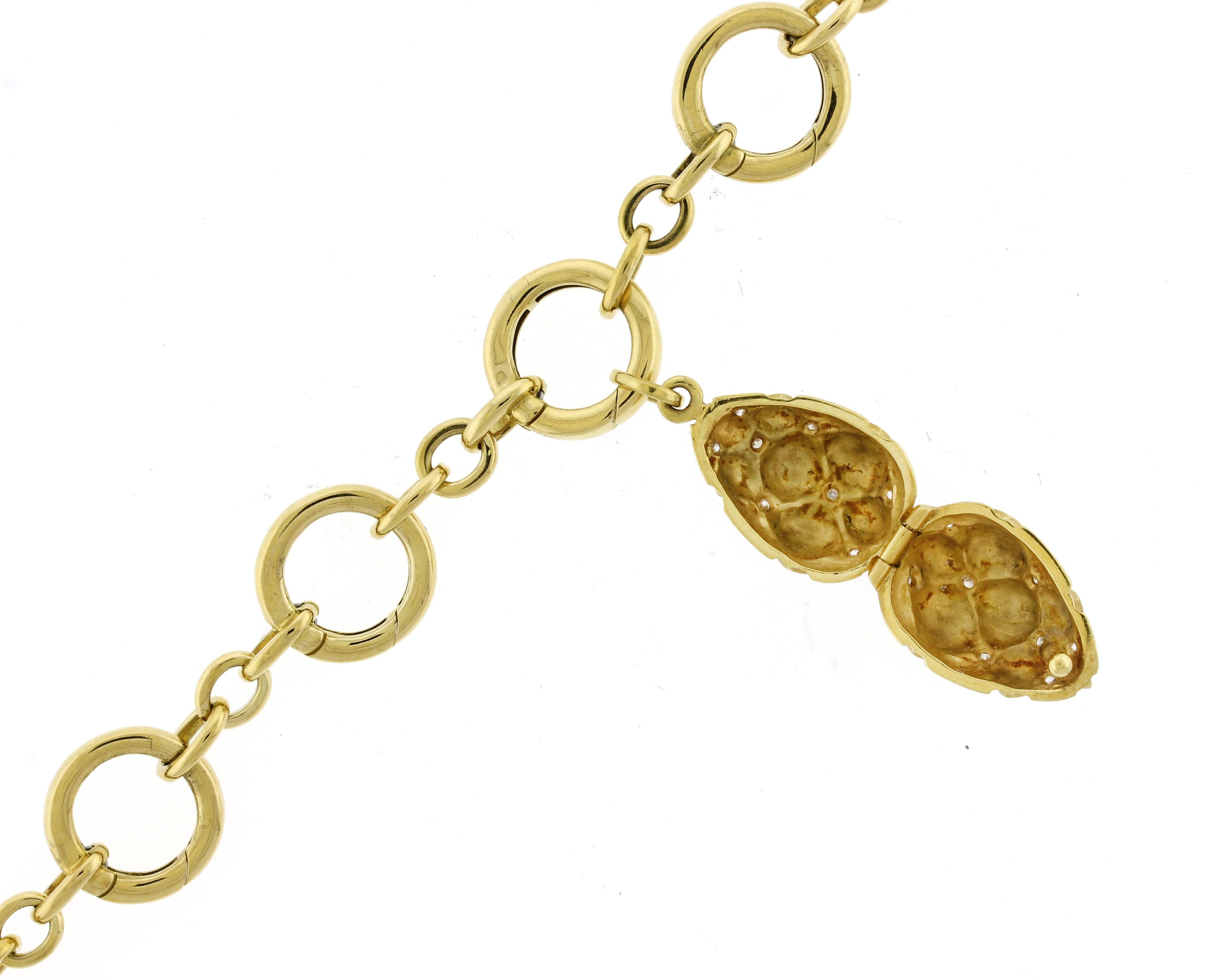 This exquisite Tiffany & Co. charm bracelet is crafted from luxurious 18k yellow gold and showcases timeless elegance and craftsmanship. Measuring 7 inches in length and weighing 25.3 grams, it features 8 unique snap bales designed for easy addition