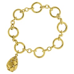 Tiffany & Co. 18k Yellow Gold Charm Bracelet with Diamond Egg Locket