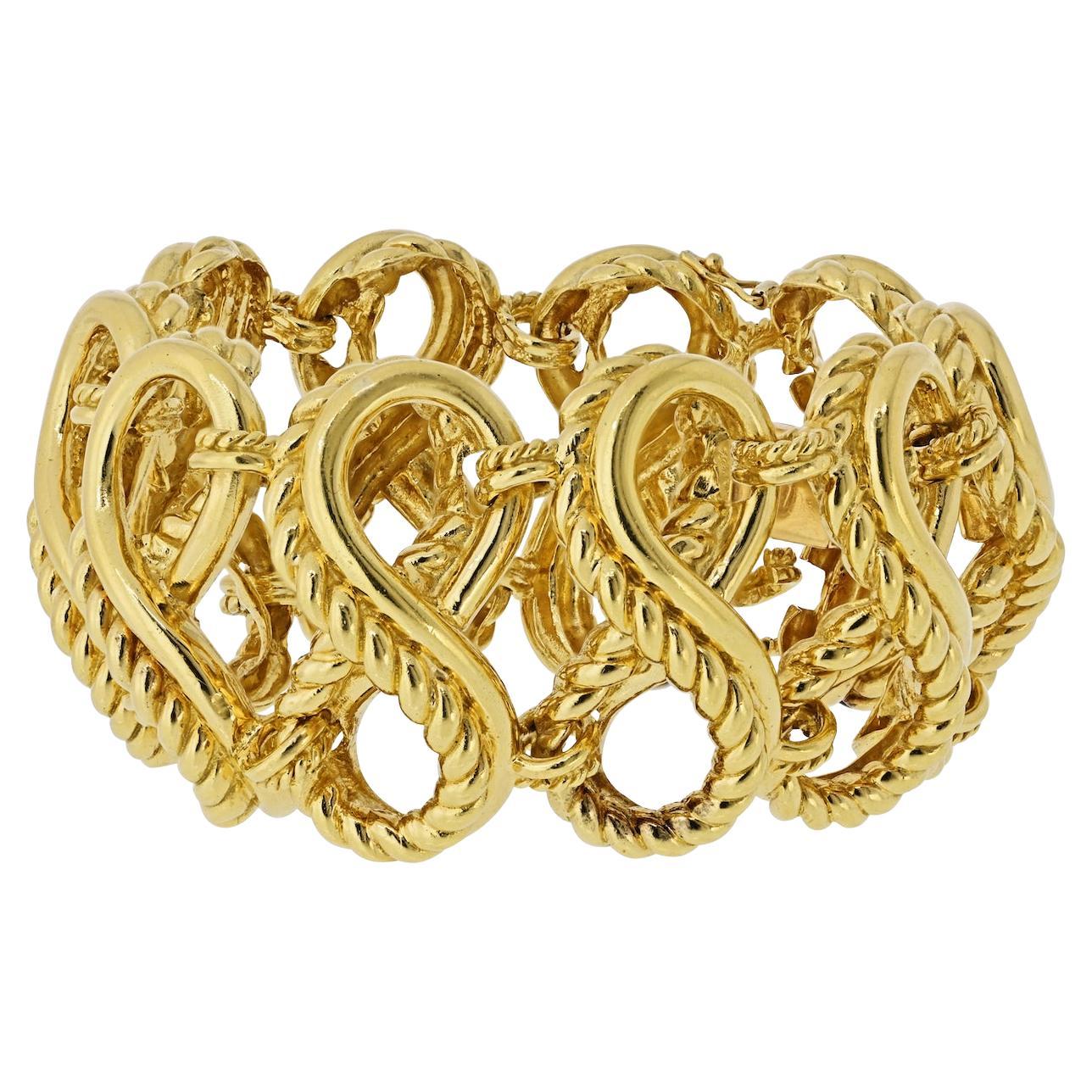 A. Link 
Co. in oro giallo 18 carati, circa anni 
70, con gabbia a maglie intrecciate in vendita