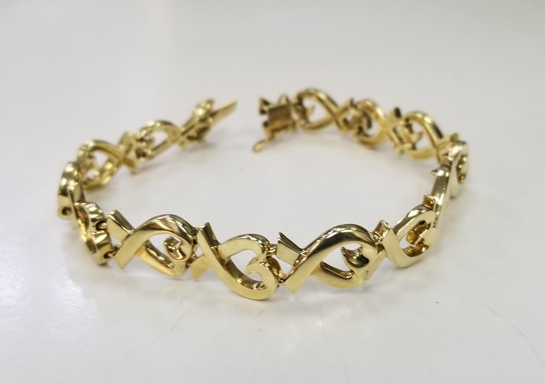 Women's or Men's AUTHENTIC! Tiffany & Co 18k Yellow Gold Classic Loving Heart Picasso Bracelet For Sale