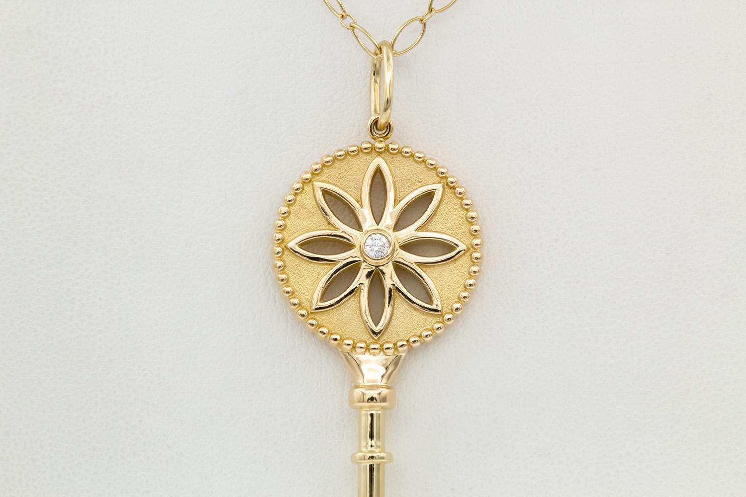 Tiffany & Co. 18k Yellow Gold & Diamond Daisy Key Pendant Necklace Large 2.5