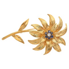Tiffany 
Co. 18K Yellow Gold Diamond 
Sapphire Flower Brooch