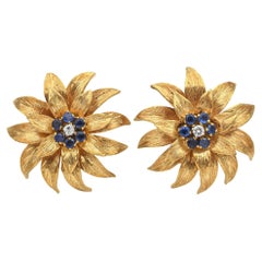 Tiffany 
Co. 18K Yellow Gold Diamond 
Sapphire Flower Clip On Earrings