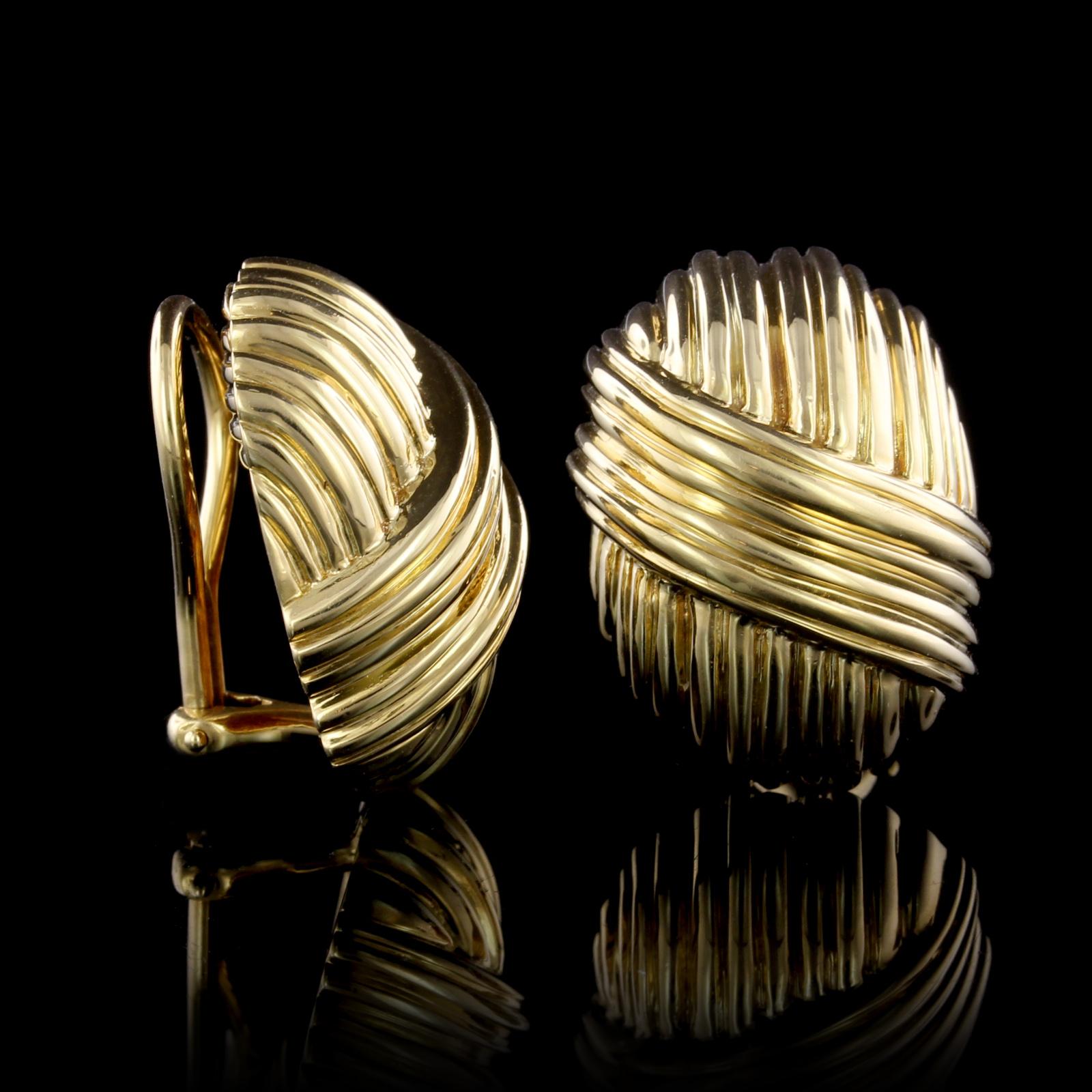 Tiffany & Co. 18K Yellow Gold Earrings. The earrings are ribbed domes, length
7/8