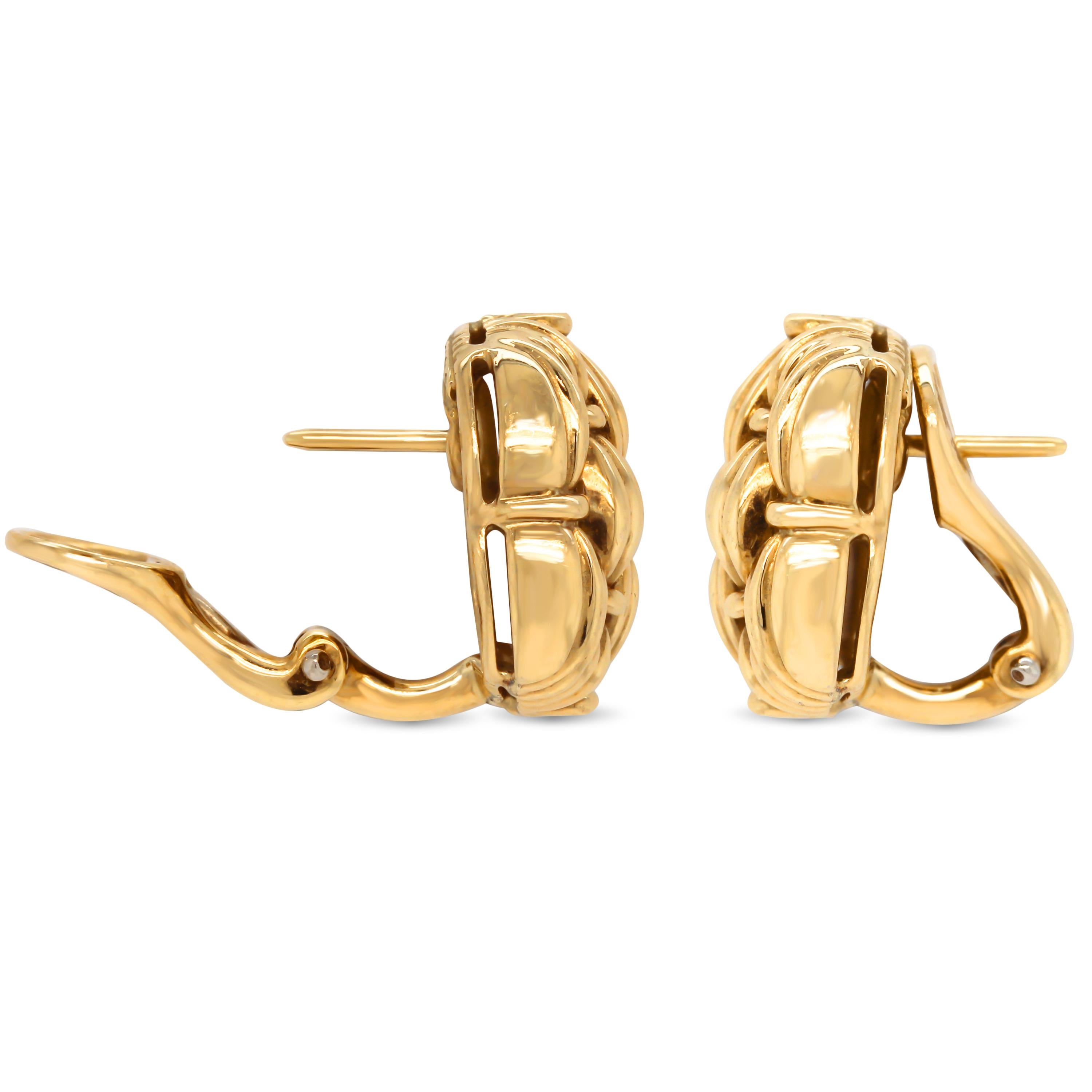 Tiffany & Co 18K Yellow Gold Earrings

Earrings have post-omega backs.

0.60 inch length by 0.50 inch in width.

Signed Tiffany & Co