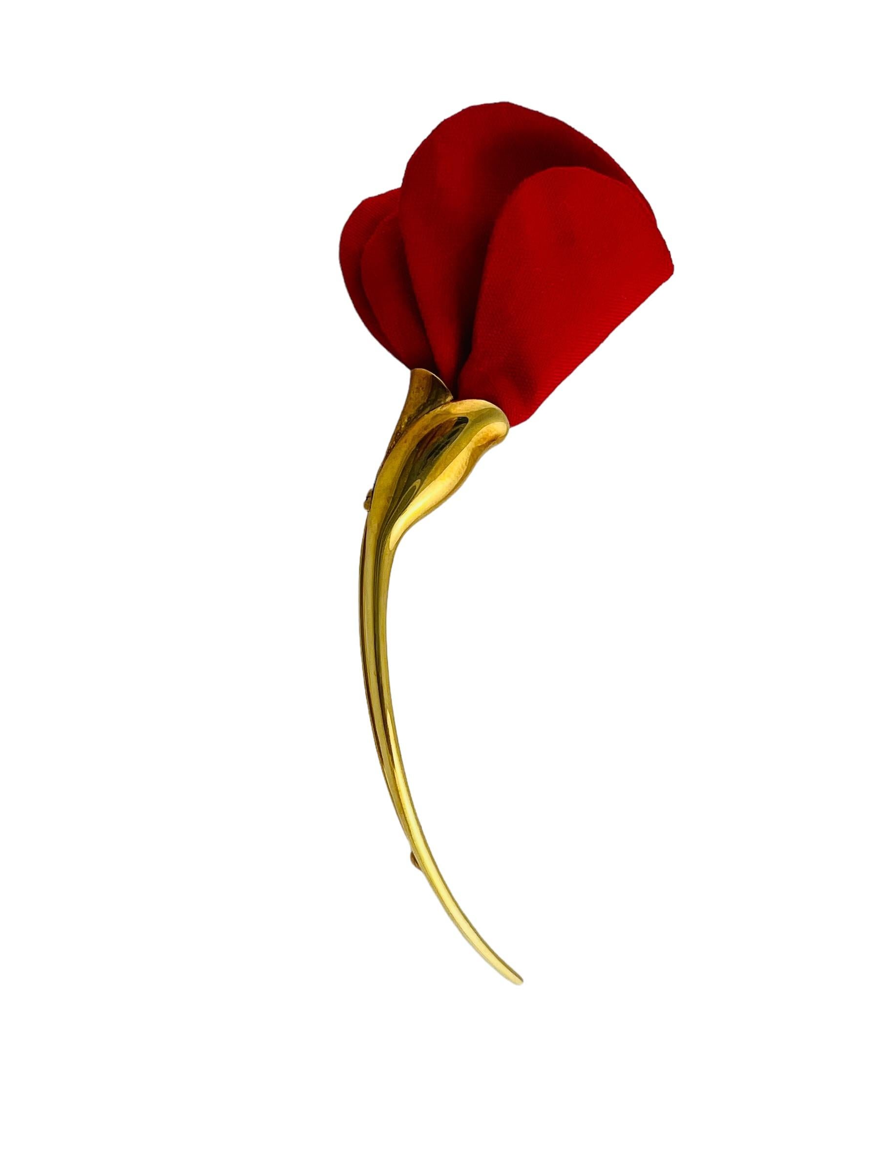Tiffany & Co. Elsa Peretti 18K Yellow Gold Amapola Poppy Brooch

This lovely Tiffany brooch was inspired by the Spanish poppy flower on an elongated stem.

Poppy flower is red silk. Stem is set in 18K yellow gold

Stamped Tiffany & Co. Elsa Peretti