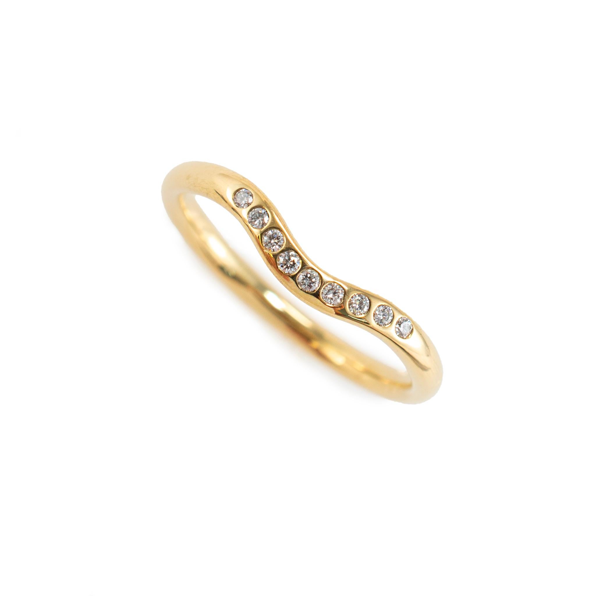 Brand: Tiffany & Co.

Gender: Women's

Metal Type: 18K yellow gold

Size: 6  

Width: 2.10 mm

Weight: 2.38 grams

Ladies designer 18K yellow gold, diamond wedding band with a comfort-fit shank. The metal was tested and determined to be 18K yellow