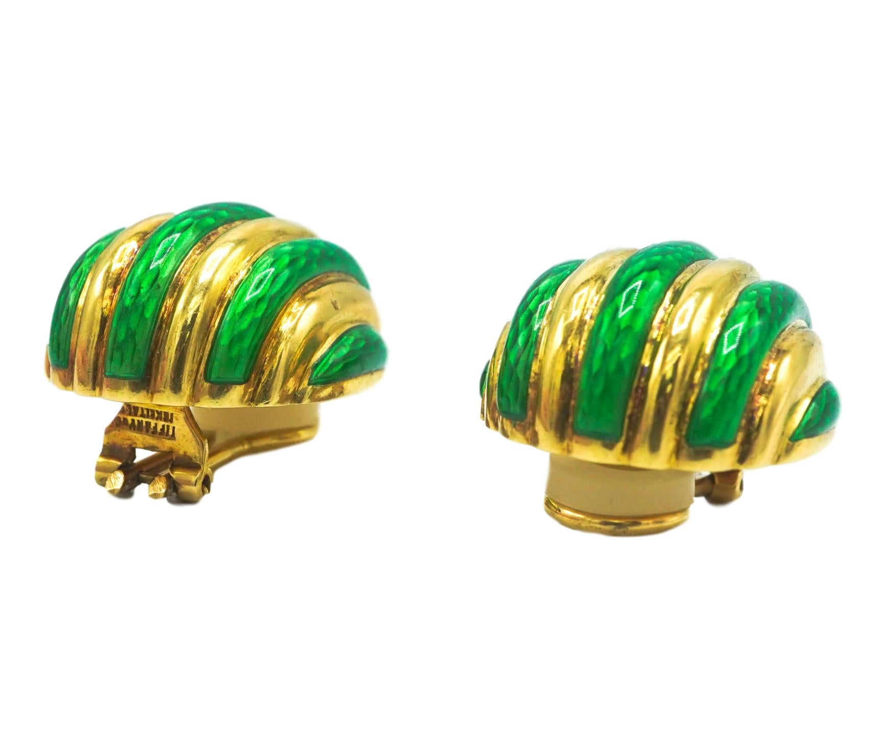Tiffany & Co. Enamel and Gold Earrings of fluted bombe' form set with rows of green enamel.
Metal: 18K Yellow Gold
Signature: Tiffany& Co
Marks: 18K Italy 
Size/Dimensions: 2.4 x 2.1 cm

SKU#E-01974