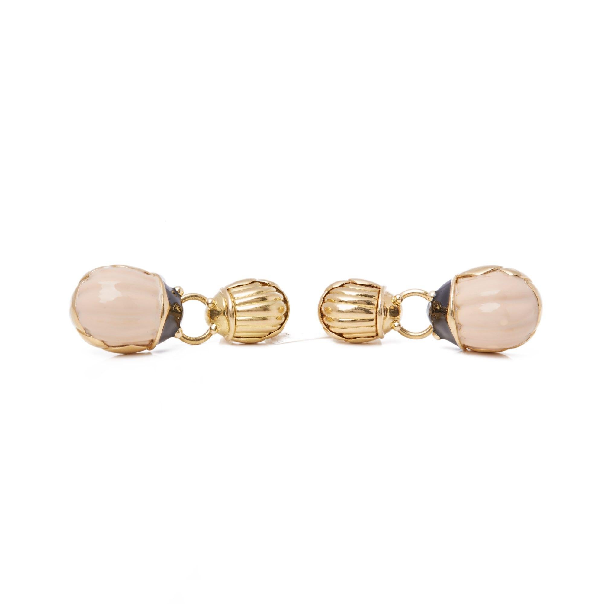 These Earrings by Tiffany & Co feature Two Graduated Beetle Sections set with Enamel Mounted in 18k Yellow Gold With Omega Fittings. 