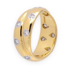 Tiffany 
Co. 18K Yellow Gold Etoile Crossover Diamond Band Ring Size 4.75