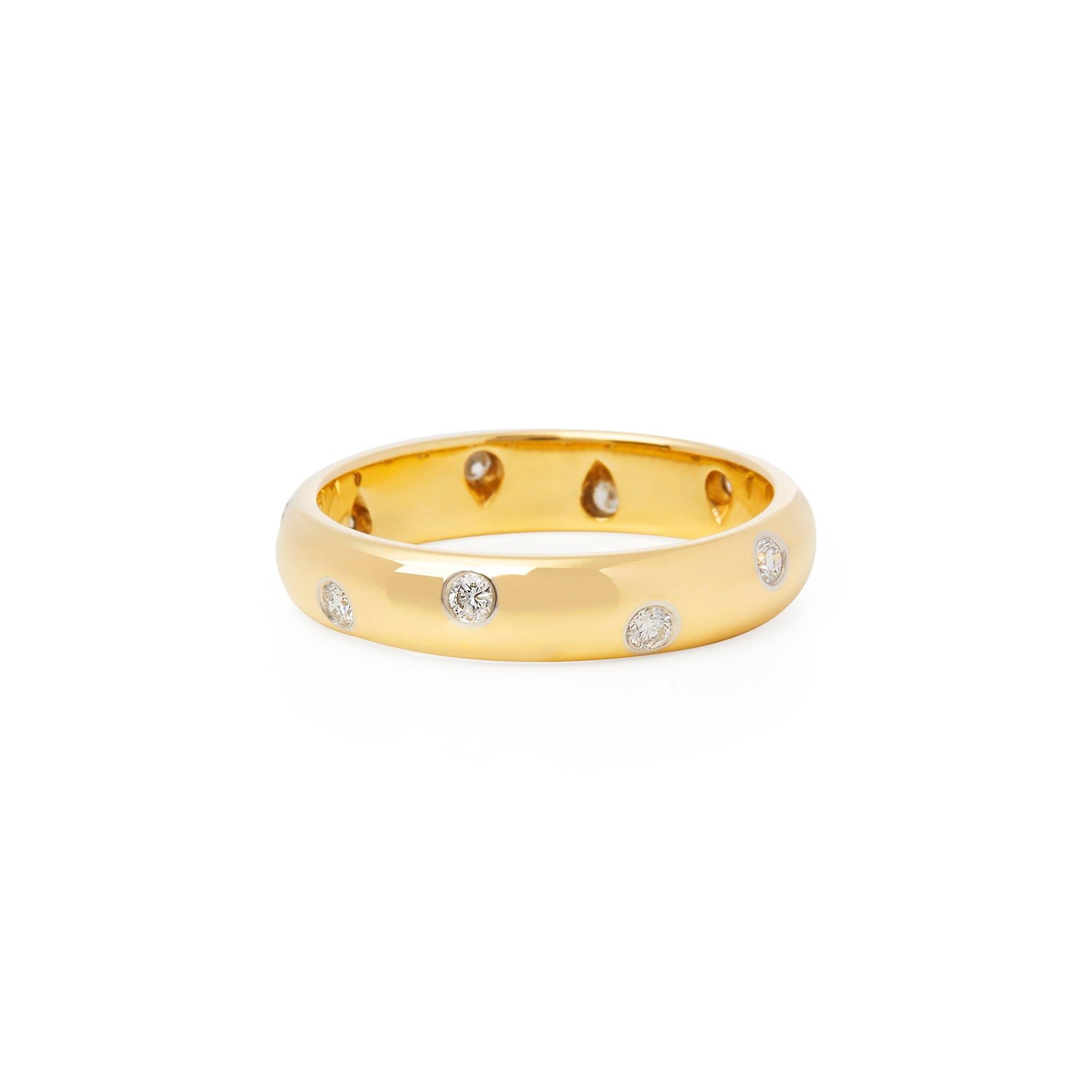 This Ring by Tiffany & Co is from their Signature Etoile collection and features Twelve Round Brilliant Cut Diamonds Mounted in an 18k Yellow Gold Band. Finger Size UK O 1/2, EU Size 55, USA Size 7. Complete with Xupes Presentation Box. Our Xupes