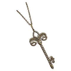 Tiffany & Co 18K Yellow Gold Fleur De Lis Key Diamond Pendant Necklace