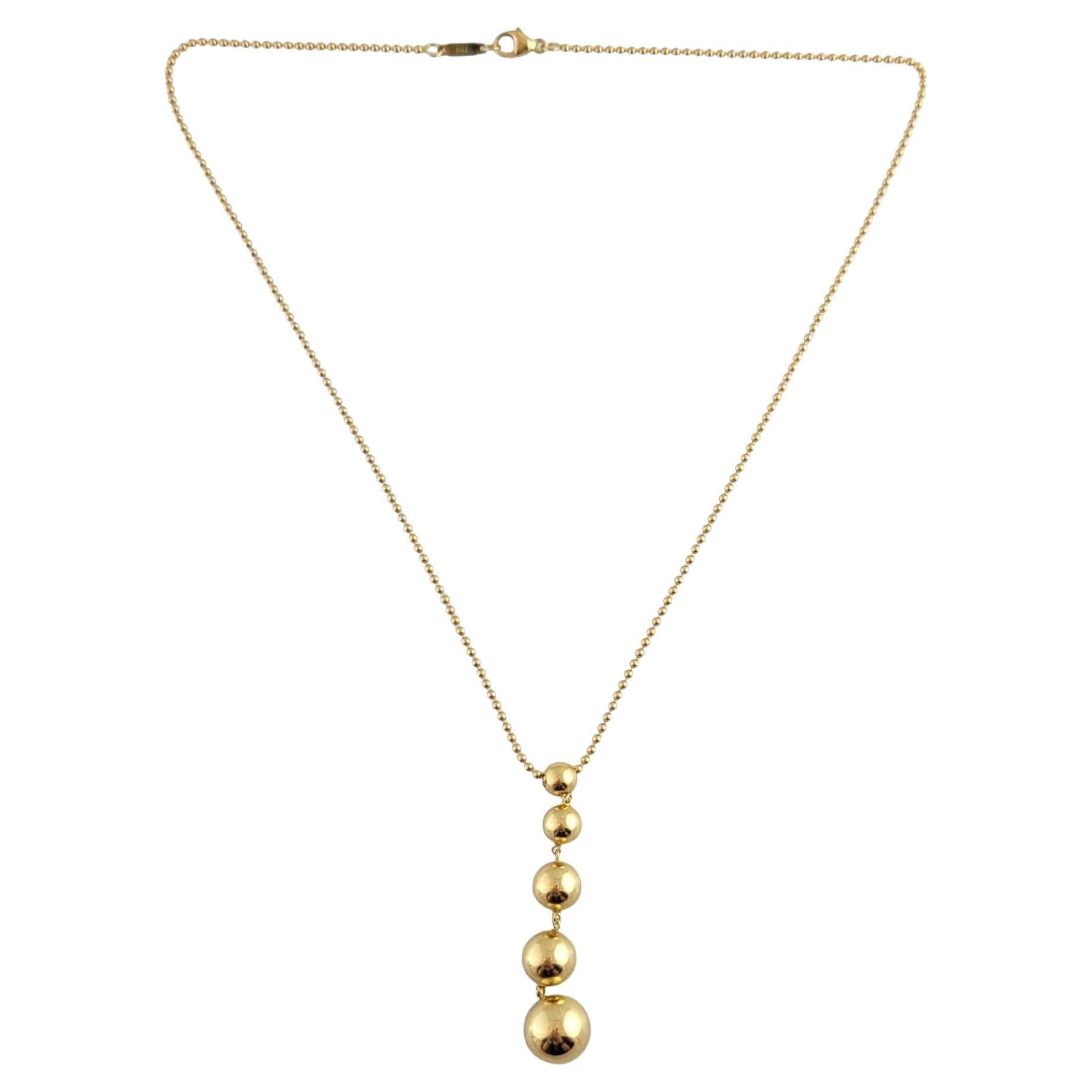 Tiffany & Co, collier pendentif en or jaune 18 carats avec perles graduées n° 14791