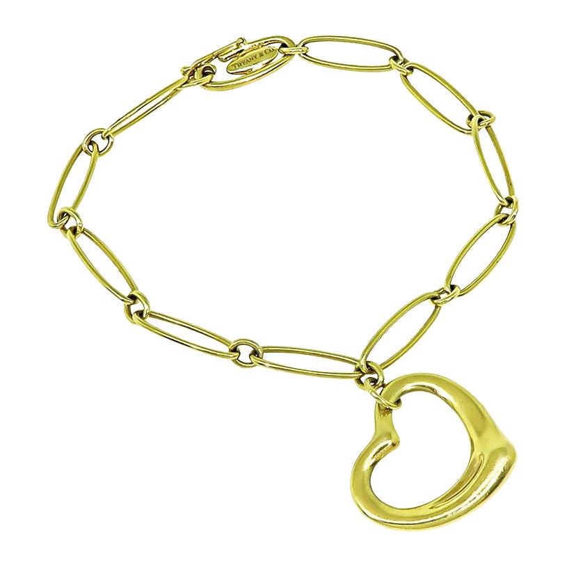 Tiffany & Co 18k Yellow Golding & Co. Heart Charm Bracelet en vente