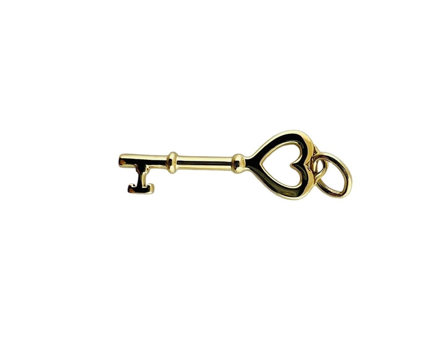 Tiffany & Co. 18K Yellow Gold Heart Key Pendant #16679 In Good Condition In Washington Depot, CT
