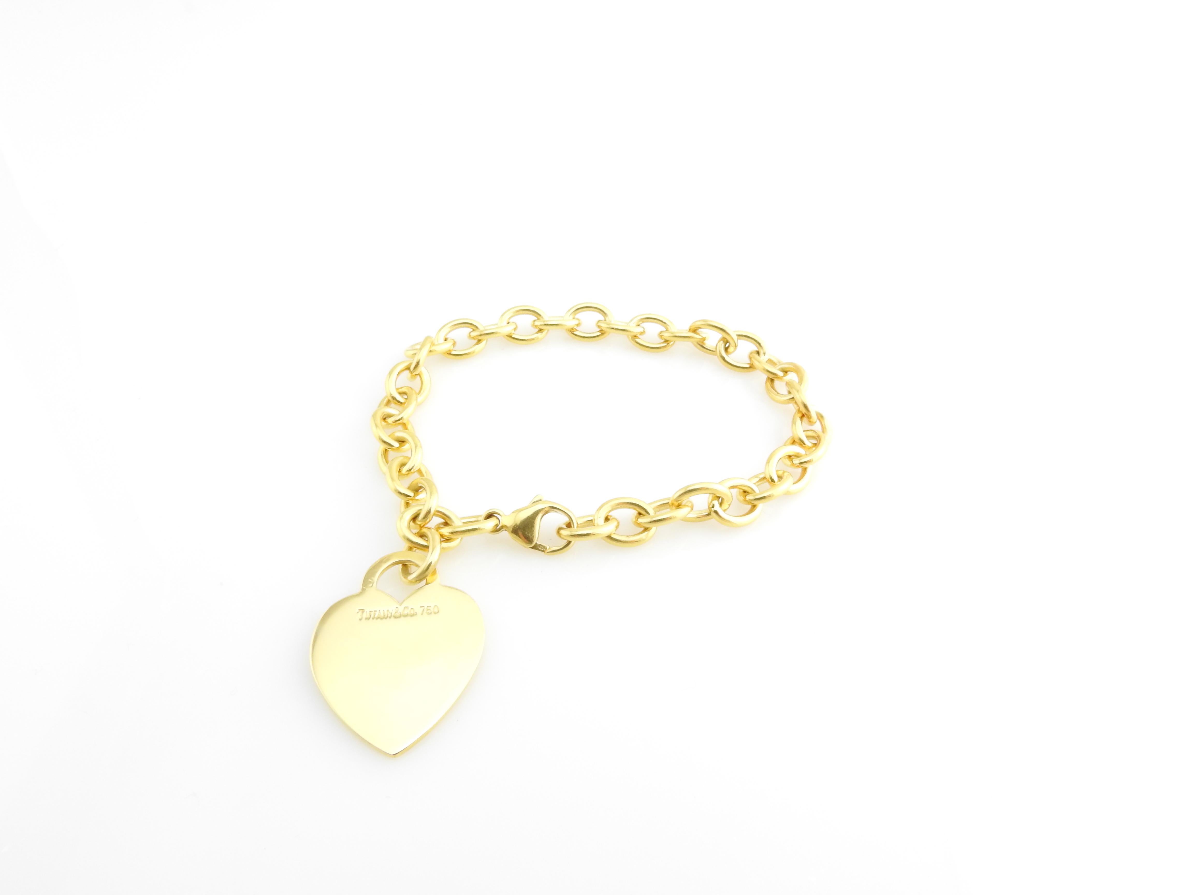 Tiffany & Co. 18K Yellow Gold Heart Tag Link Bracelet

This authentic Tiffany & Co. bracelet is approx. 7.5