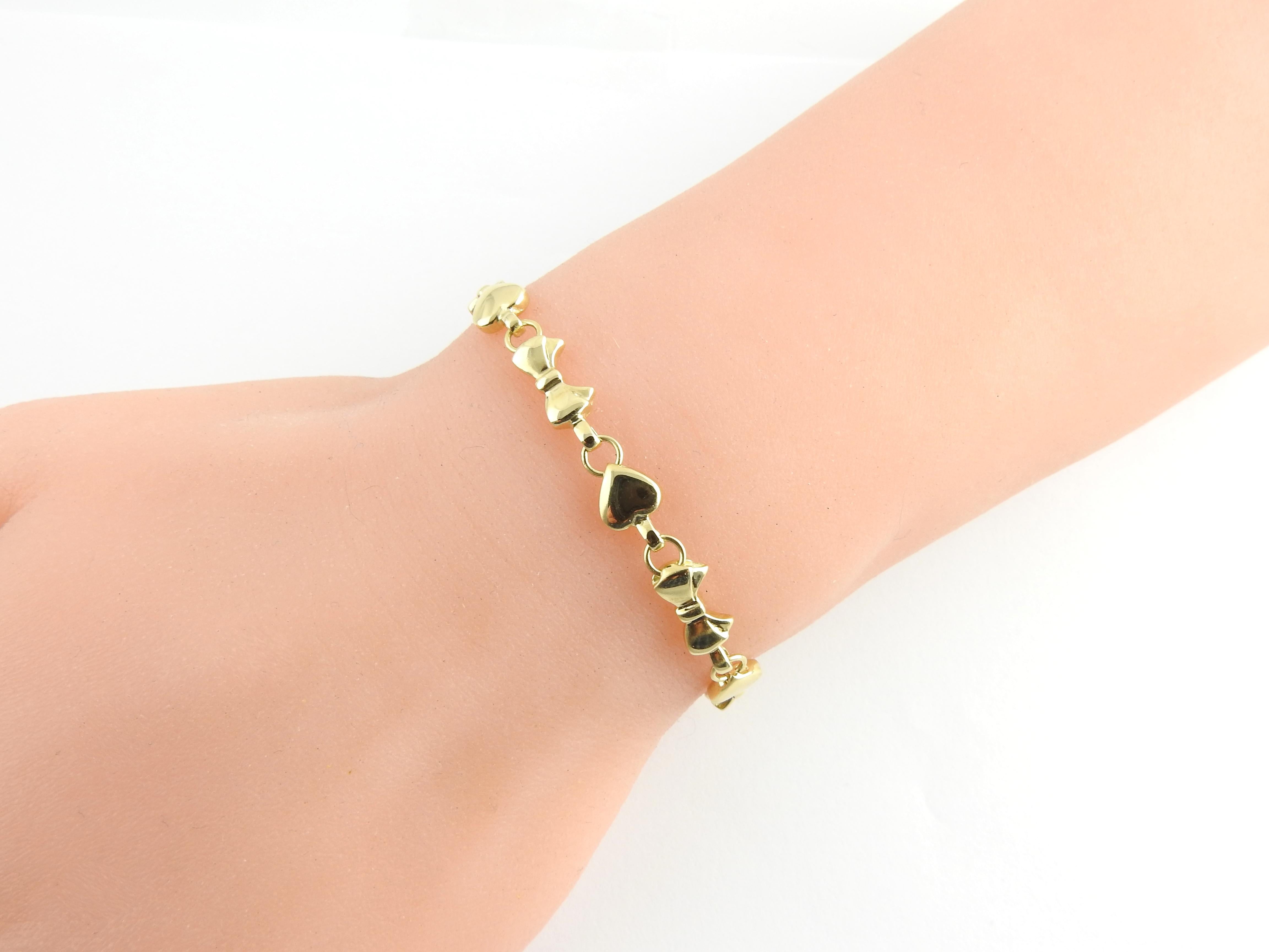 Tiffany & Co. 18 Karat Yellow Gold Hearts and Bows Link Bracelet 1
