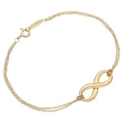Tiffany
Co. Bracelet double chaîne Infinity en or jaune 18k