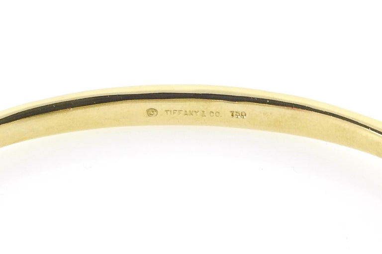 Tiffany and Co. 18K Yellow Gold Interlocking Double Loop Bangle ...