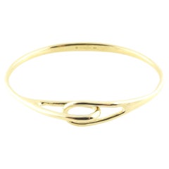 Tiffany & Co. 18K Yellow Gold Interlocking Double Loop Bangle Bracelet