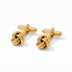 Gemelos con forma de nudo de Tiffany & Co. en oro amarillo de 18 quilates