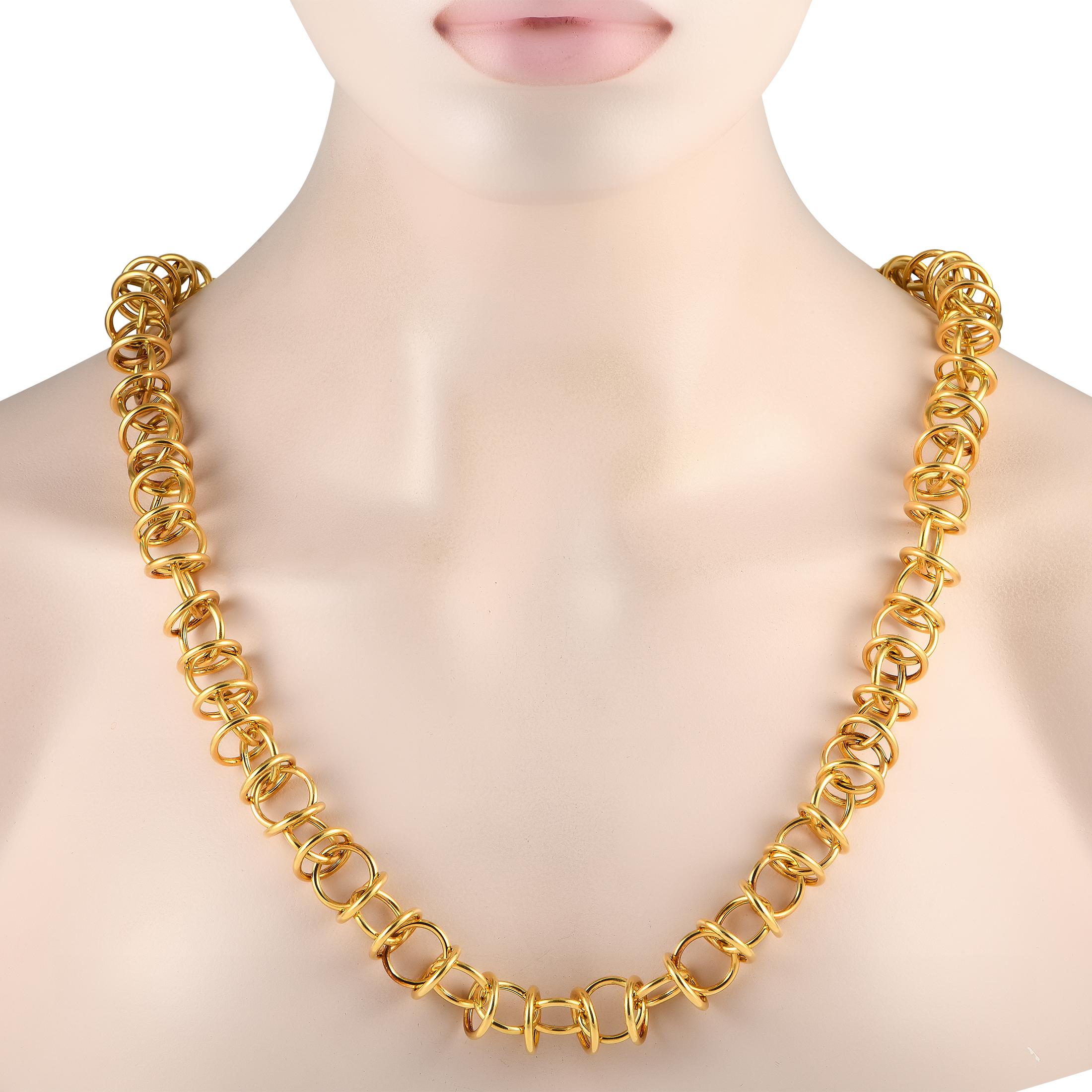 A series of circular 18K Yellow Gold links make this bold Tiffany & Co. necklace impossible to ignore. Simple yet statement-making, this impeccably crafted accessory measures 30 long. This jewelry piece is offered in estate condition and includes a