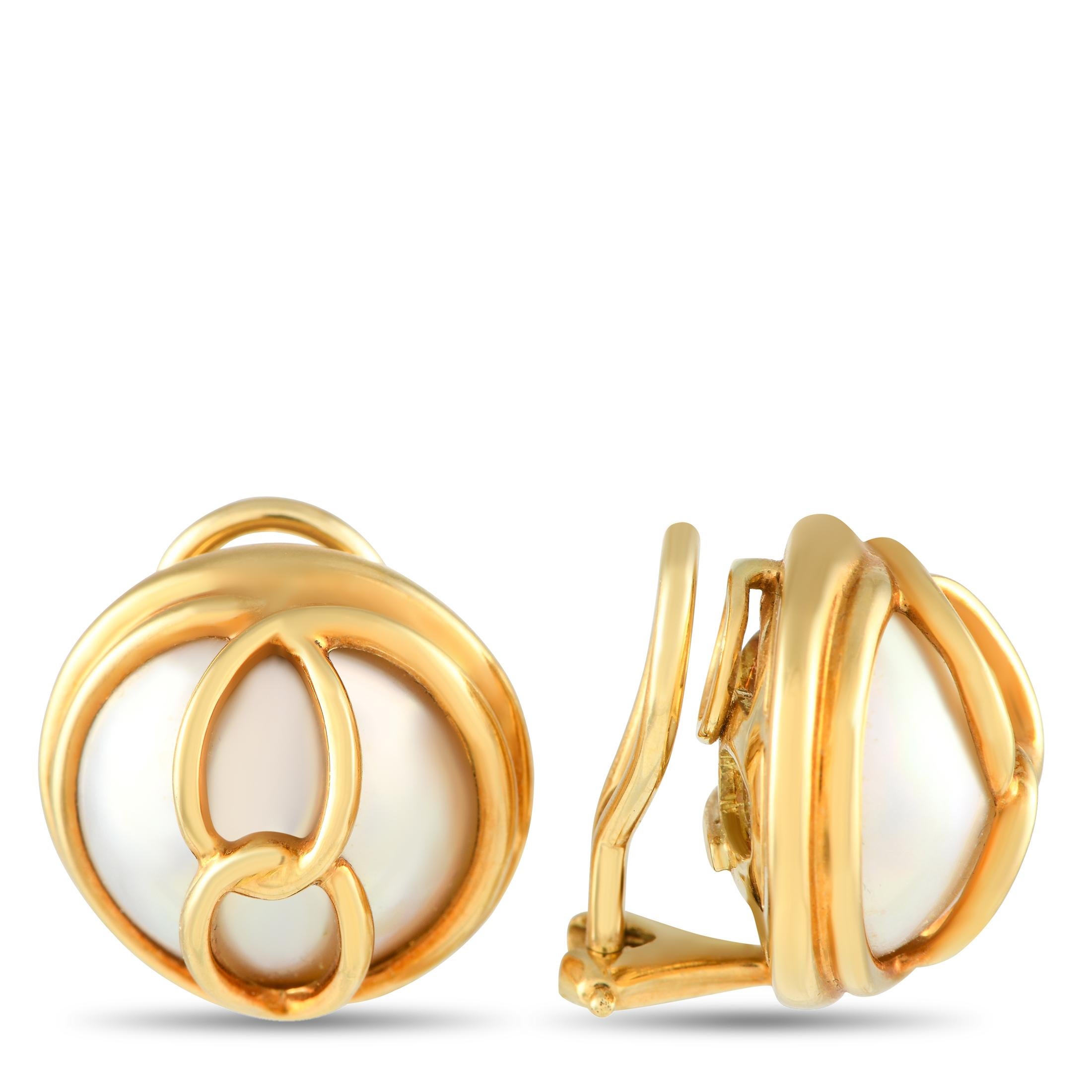 A classic choice to infuse elegance into your looks. These earrings by Tiffany & Co. feature mab pearls or half pearls, each with one flat side and one rounded side. The dome-shaped pearls on this pair of clip-on earrings offer a unique luster with