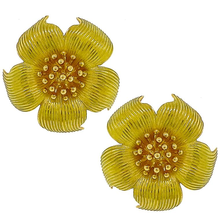 The flower earrings measure 26mm by 25mm and weighs 19.4 grams.
They earrings are signed T&Co 750.

Inventory #99460PSSS