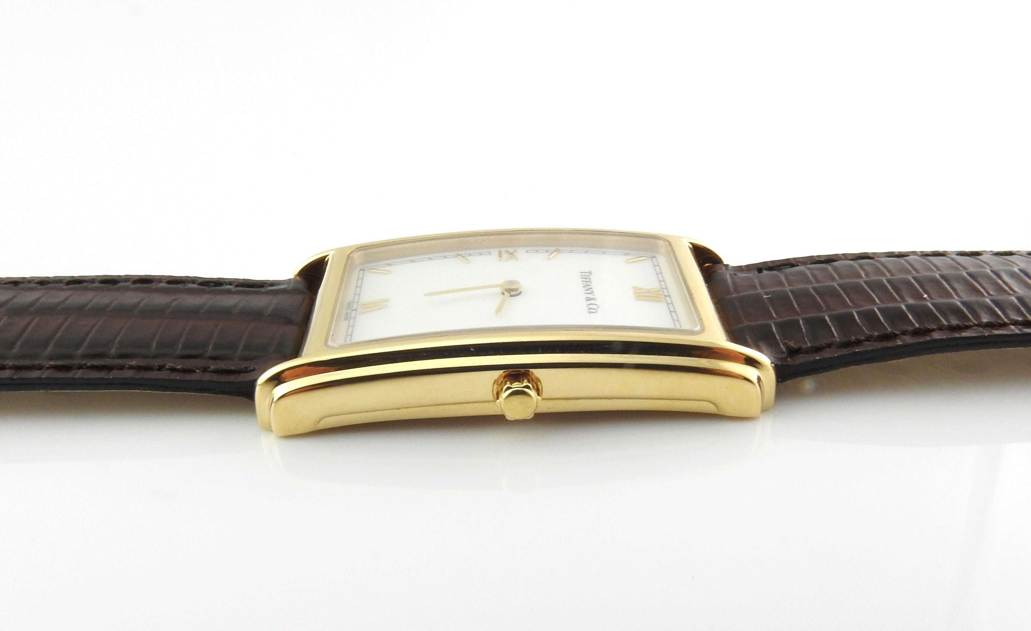 gold rectangular watch