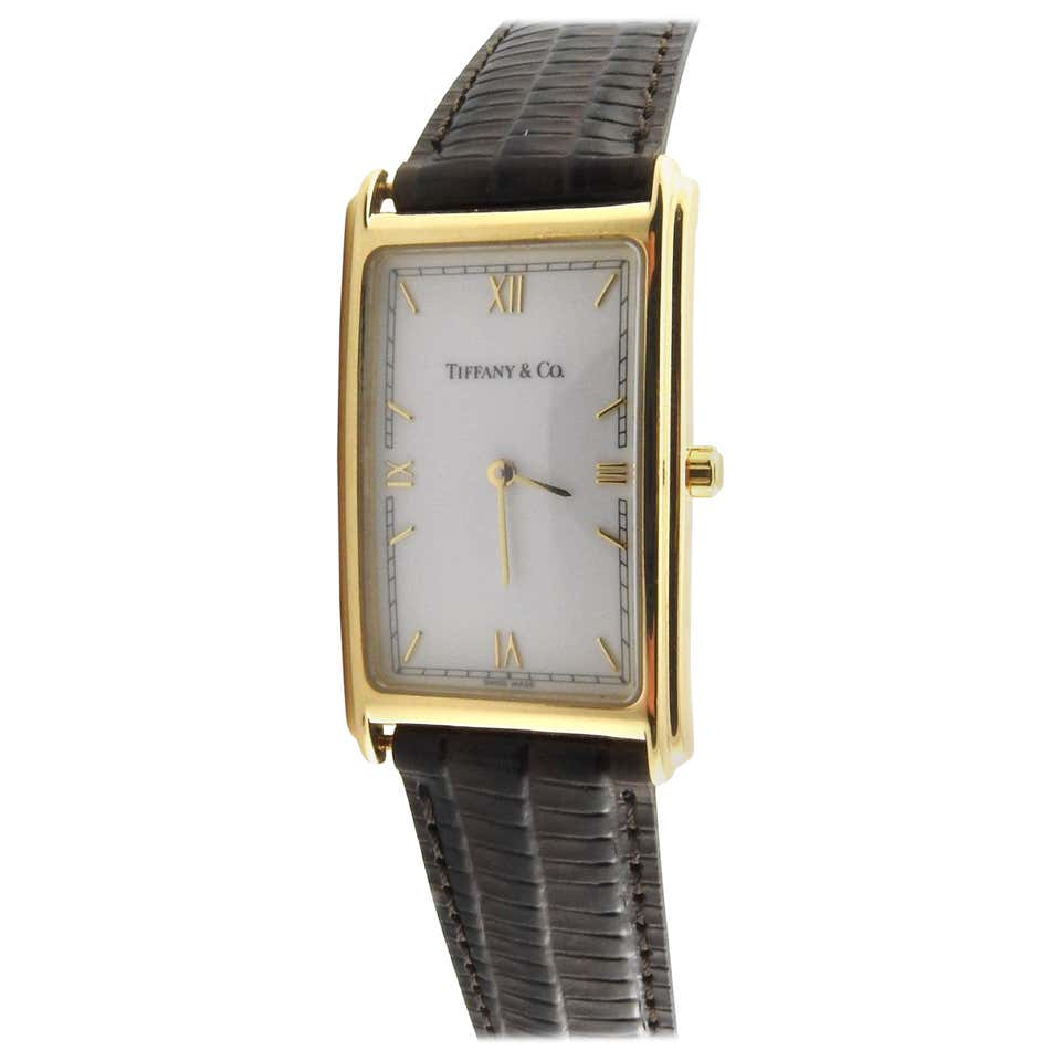 Tiffany and Co. 18 Karat Gold Men's Rectangular Watch White Dial Roman Markers at 1stDibs mens Tiffany and Co. 18 Karat Gold Men's Rectangular Watch White Dial Roman Markers at 1stDibs mens