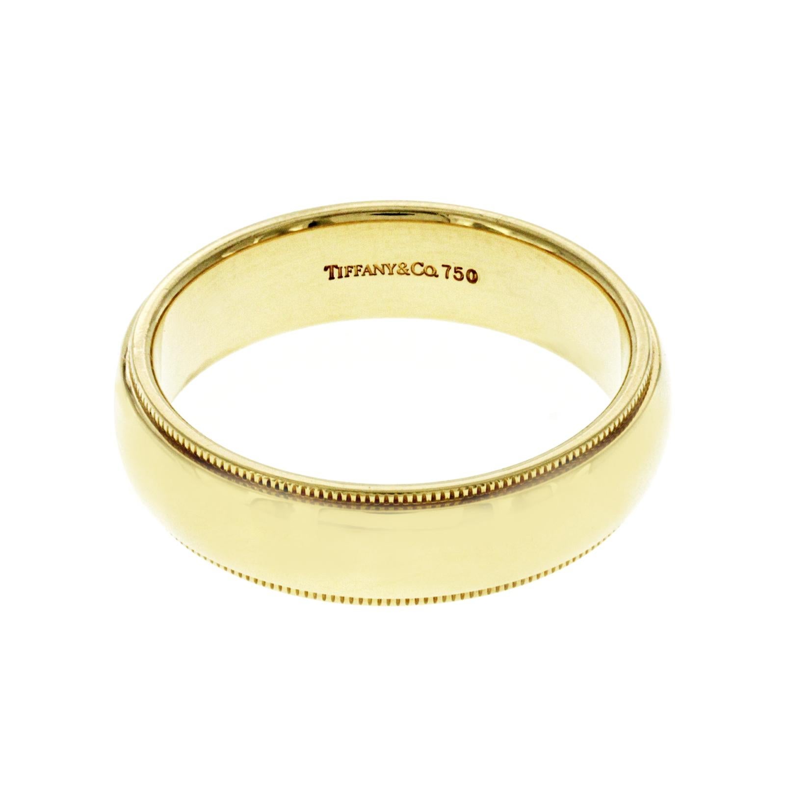 100% Authentic, 100% Customer Satisfaction

Top: 6 mm

Band Width: 6 mm

Metal: 18K Yellow Gold

Size: 10.5

Hallmarks: TIFFANY & CO 750

Total Weight: 11 Grams

Stone: None

Condition: PreOwned

Estimated Retail Price: $2300

Stock Number: U518