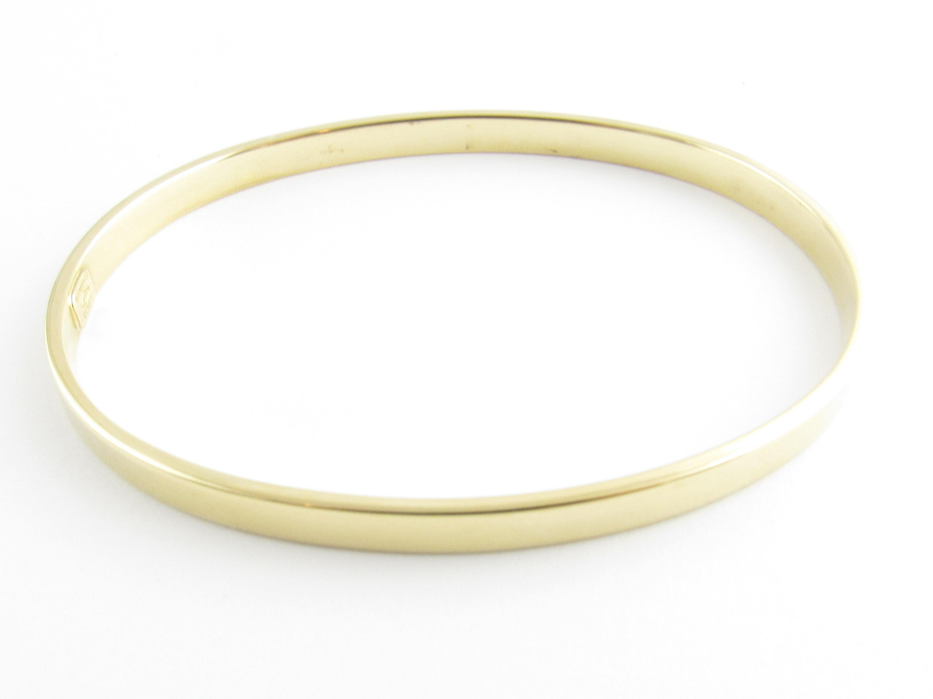 Vintage Tiffany & Co. 18K Yellow Gold Oval Bangle Bracelet

This authentic Tiffany & Co. bangle bracelet is approx. 2 5/8