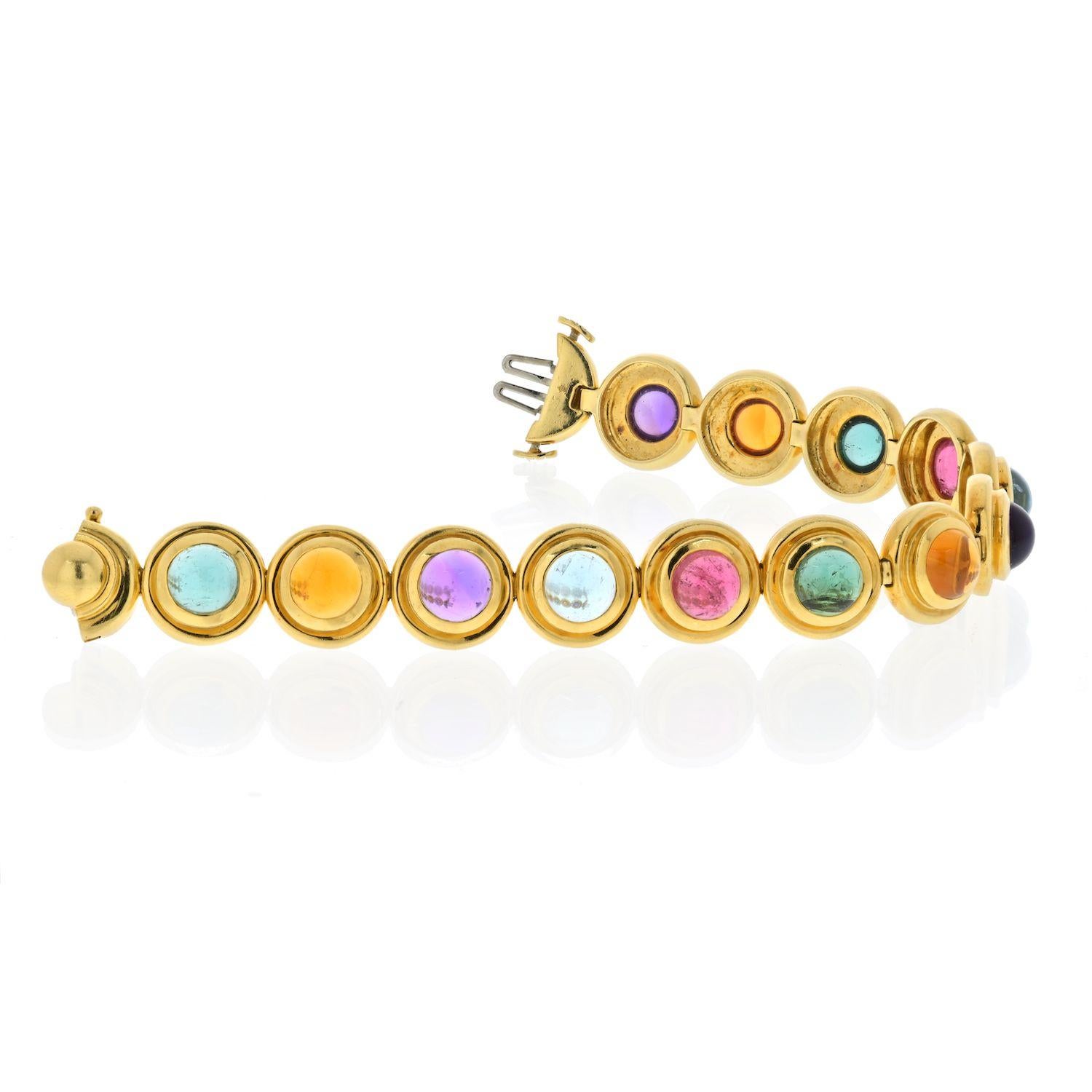 18k yellow gold bracelet, crafted by Paloma Picasso for Tiffany & Co, featuring multicolor gemstone cabochons: aquamarine, green and pink tourmaline, amethyst, citrine, peridot. Bracelet is 7