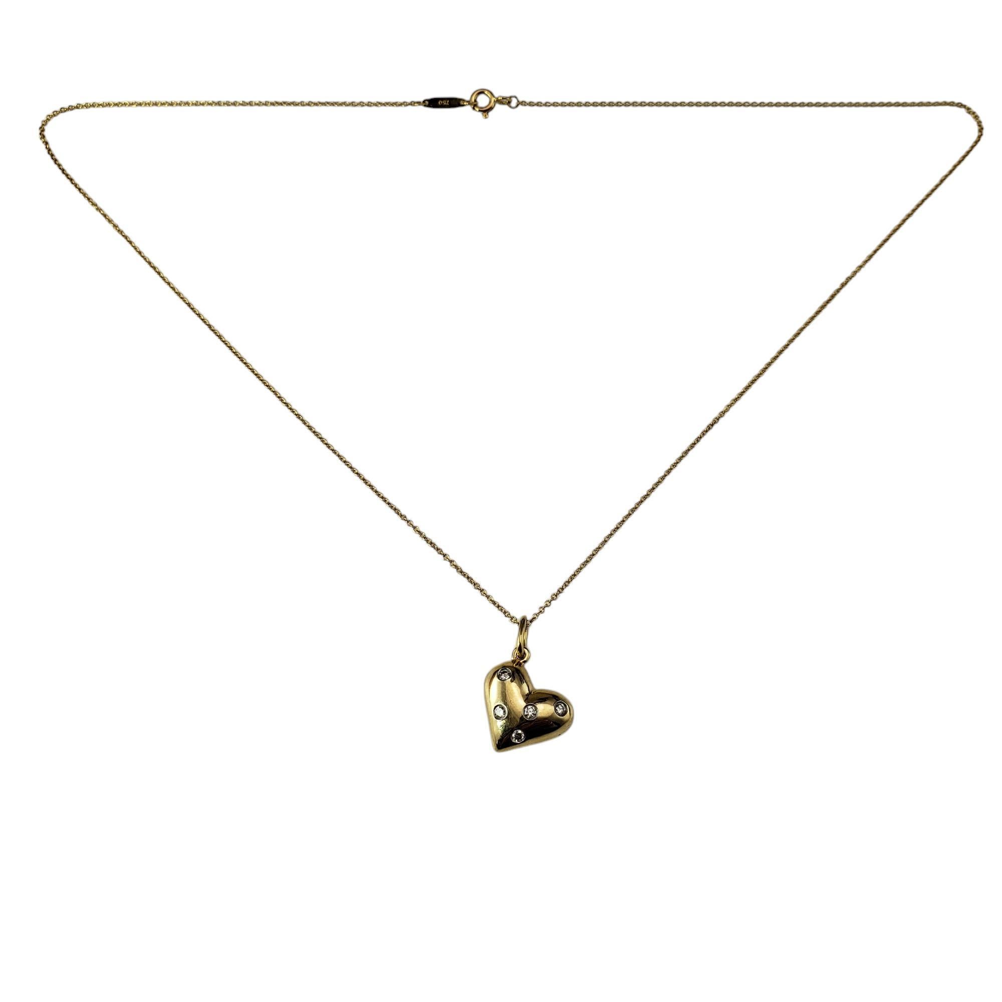 Tiffany & Co. Collar Colgante Corazón Etoile de oro amarillo de 18 quilates y platino-

Este impresionante colgante de corazón abullonado de Tiffany & Co. incluye cinco diamantes redondos de talla brillante engastados en platino, que añaden brillo a