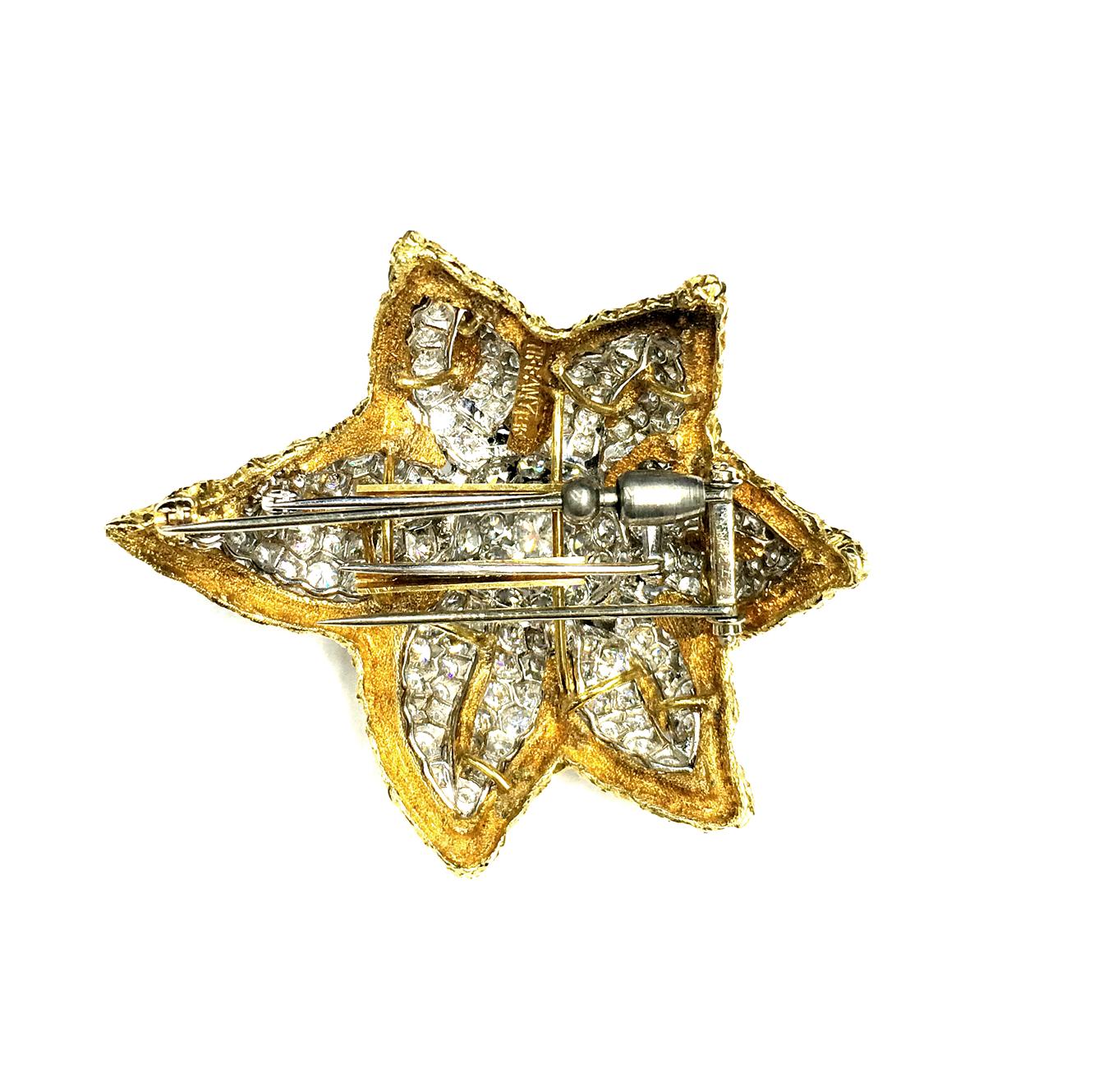 Diamond weight is 10.88cts.
Brooch dimensions: 2.4