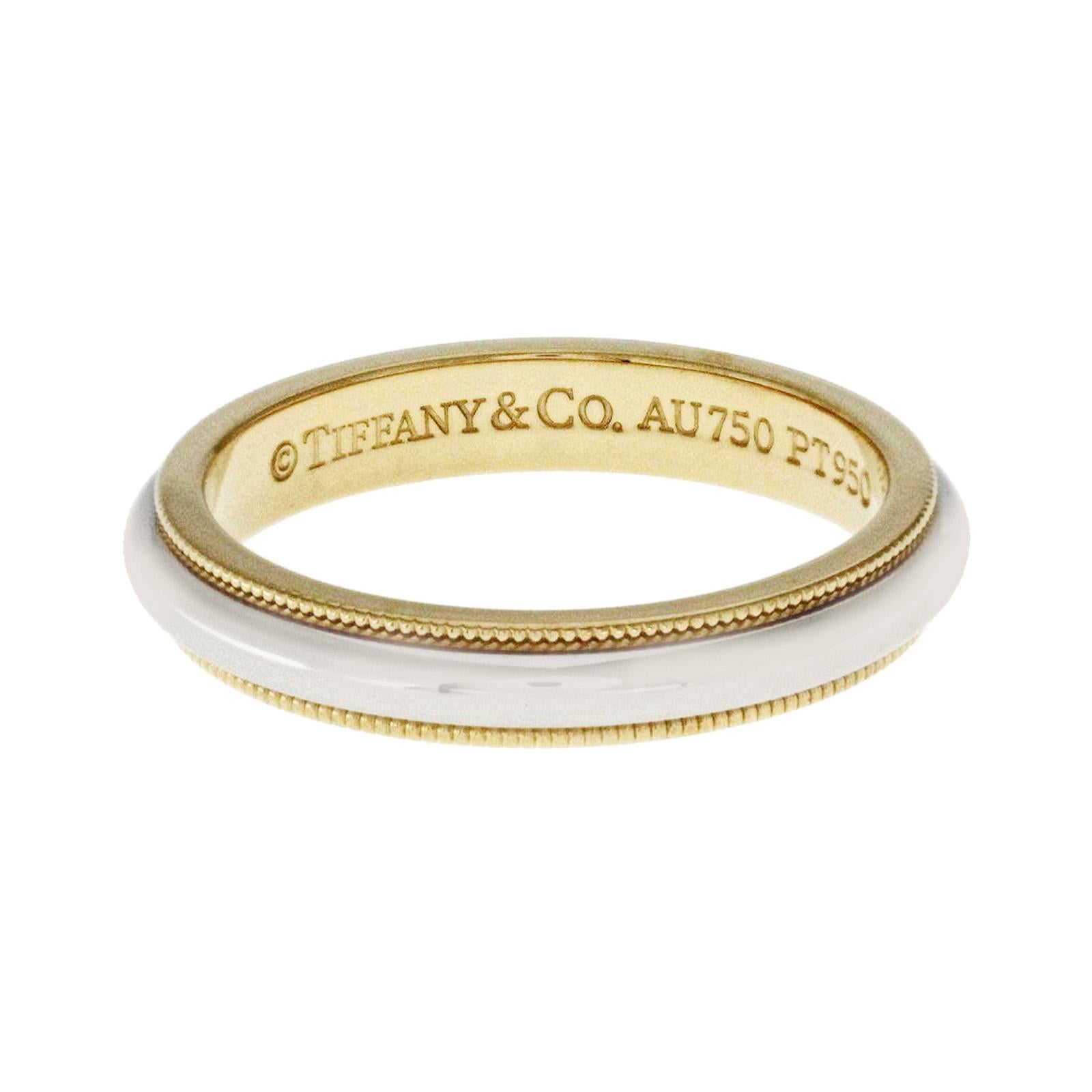 100% Authentic, 100% Customer Satisfaction

Top: 3 mm

Band Width: 3 mm

 Metal: 18K Yellow Gold & 950 Platinum

 Size: 7

 Hallmarks: Tiffany & Co 750 PT950

 Total Weight: 5.6 Grams

 Stone Type: None

 Condition: Pre Owned 