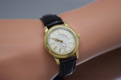Reloj Tiffany & Co Oro Amarillo 18k Esfera Romana Redonda Cuarzo 27mm
