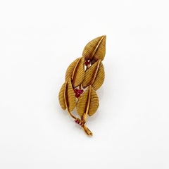 Tiffany & Co. 18k yellow gold ruby flower pin