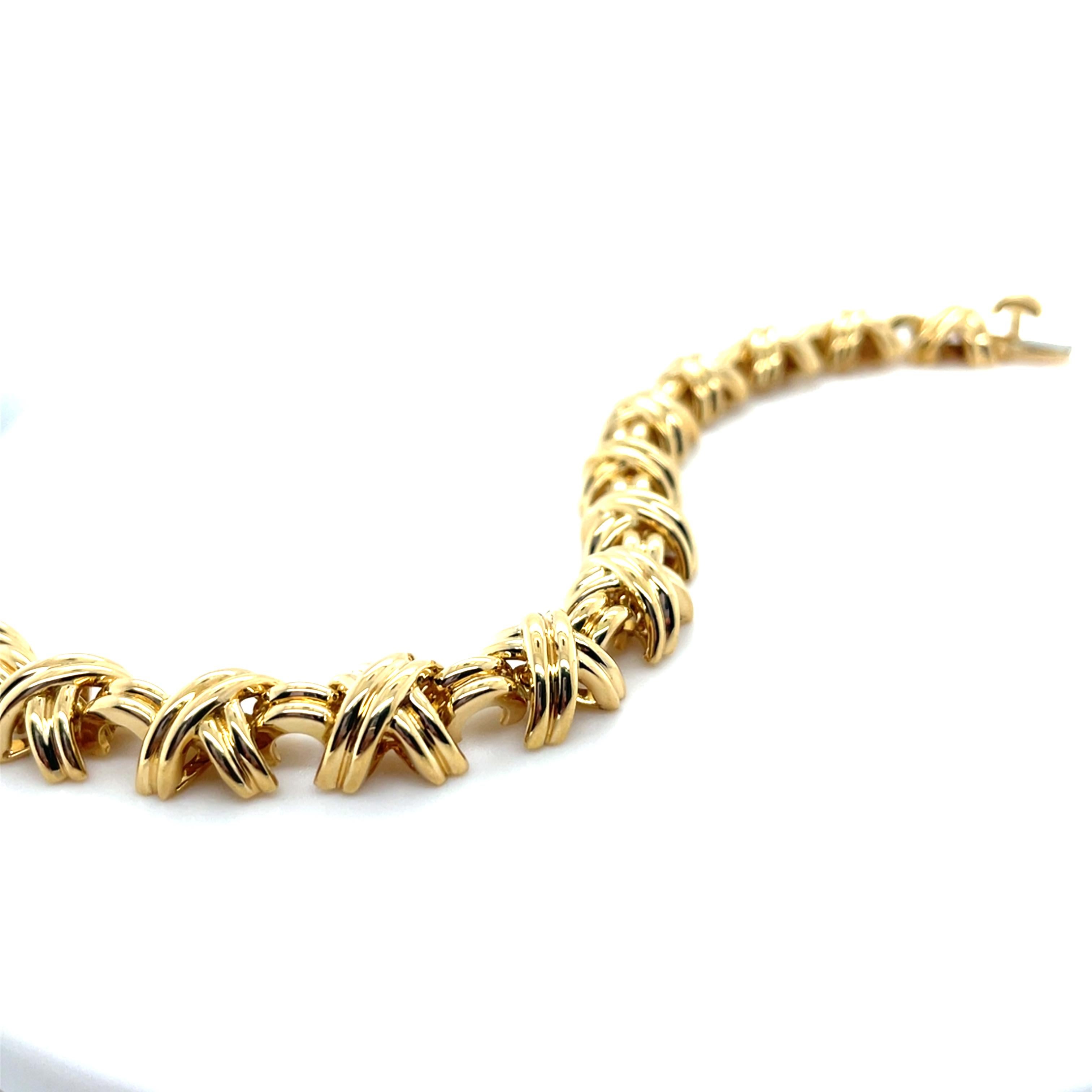 Tiffany & Co., 18K Yellow Gold Signature X Link Bracelet In Excellent Condition In Chicago, IL