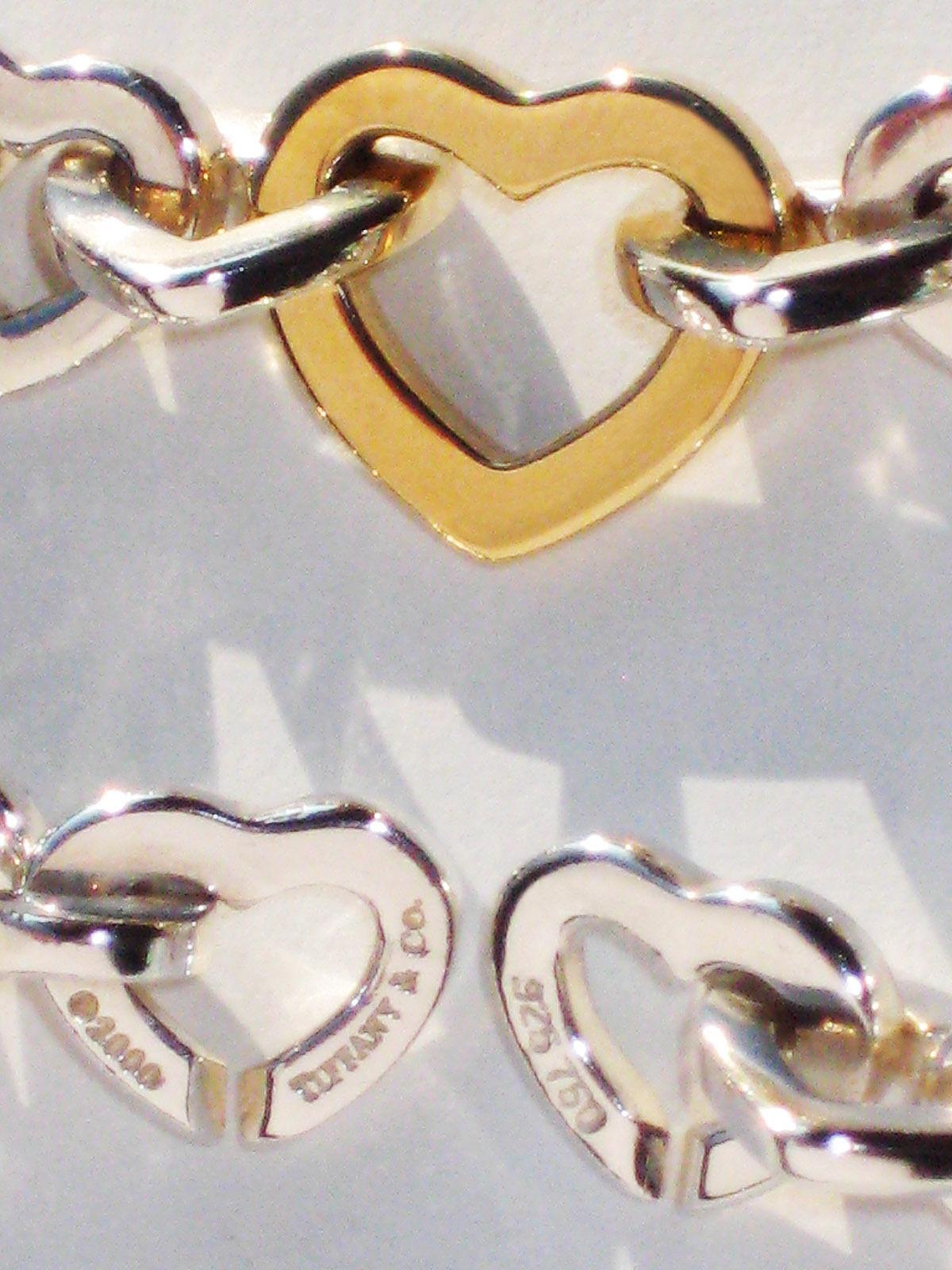 Modern Tiffany & Co. 18 Karat Yellow Gold and Sterling Silver Heart Bracelet