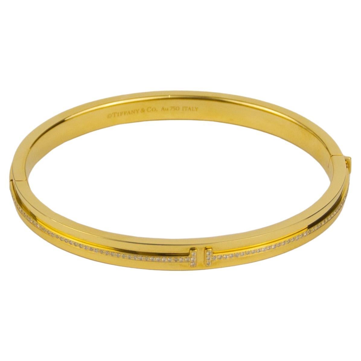 Tiffany & Co. 18k Yellow Gold T-Diamond Hinge Bangle For Sale