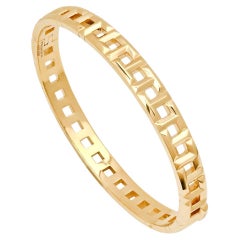 TIFFANY & Co. Bracelet à charnière étroite en or jaune 18K T Trueing