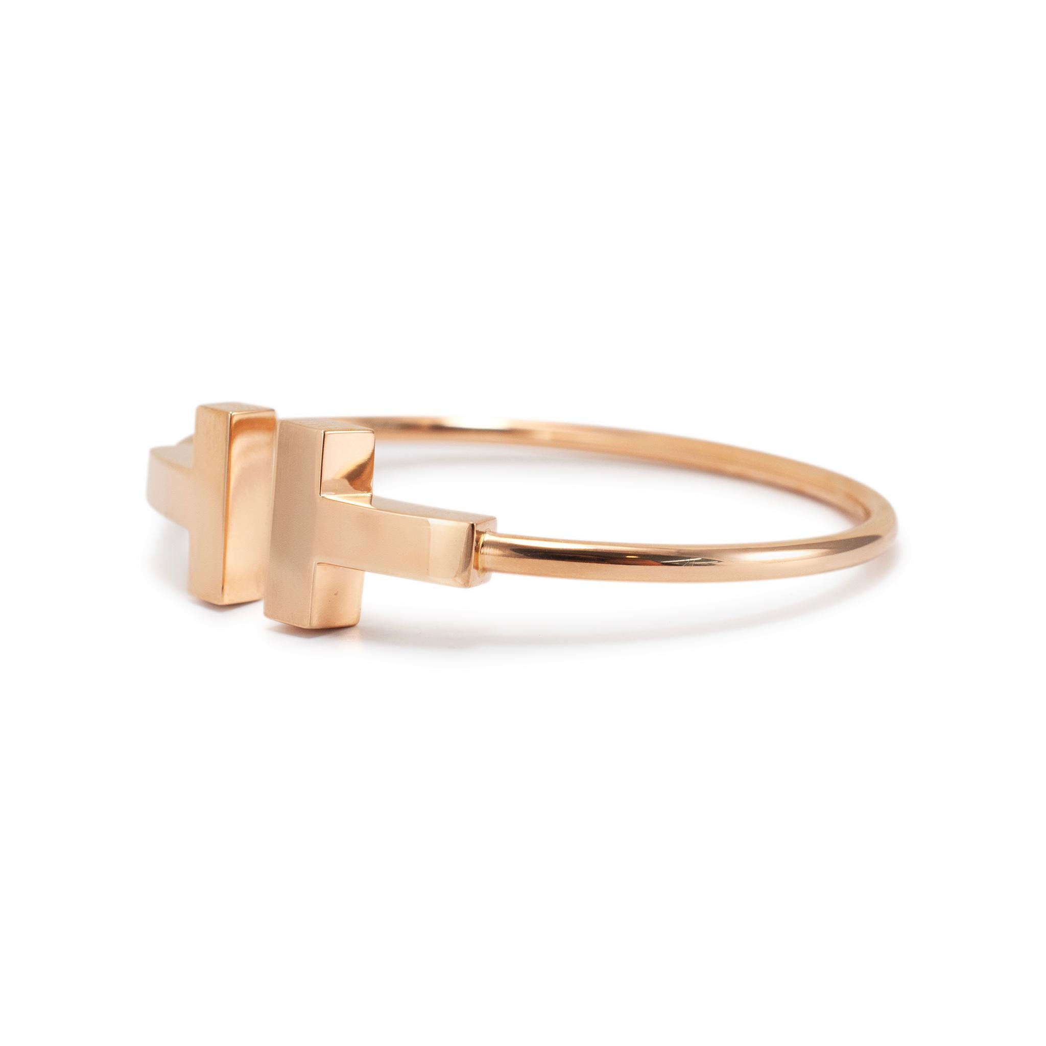 Brand: Tiffany & Co.

Gender: Ladies

Metal Type: 18K Yellow Gold

Length: 6.75 inches 

Width: 15.30 mm

Weight: 12.92 grams

One ladies 18K yellow gold flexible cuff bracelet. The metal was tested and determined to be 18K yellow gold. Engraved