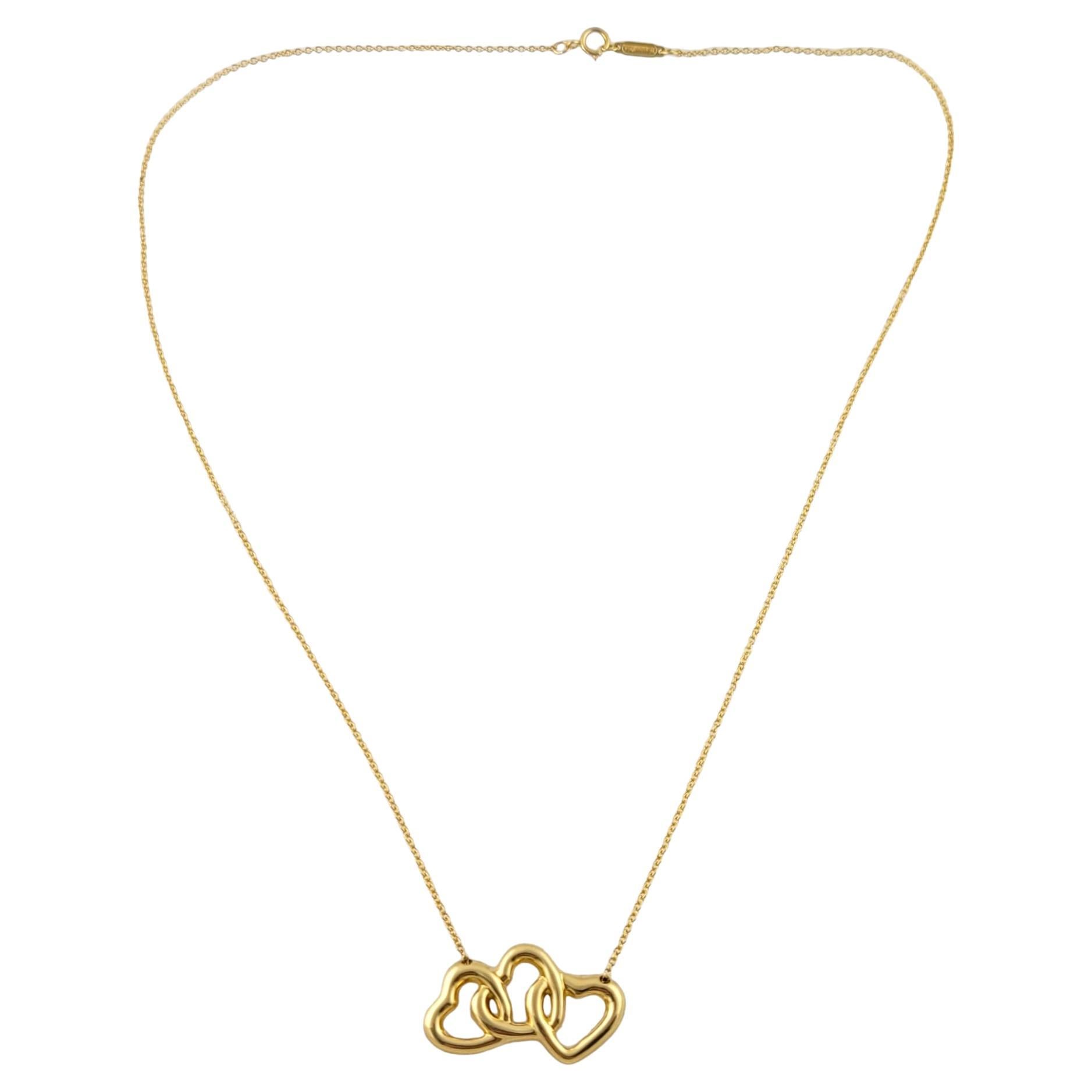 Tiffany 
Co. 18K Yellow Gold Triple Interlocking Open Hearts Necklace