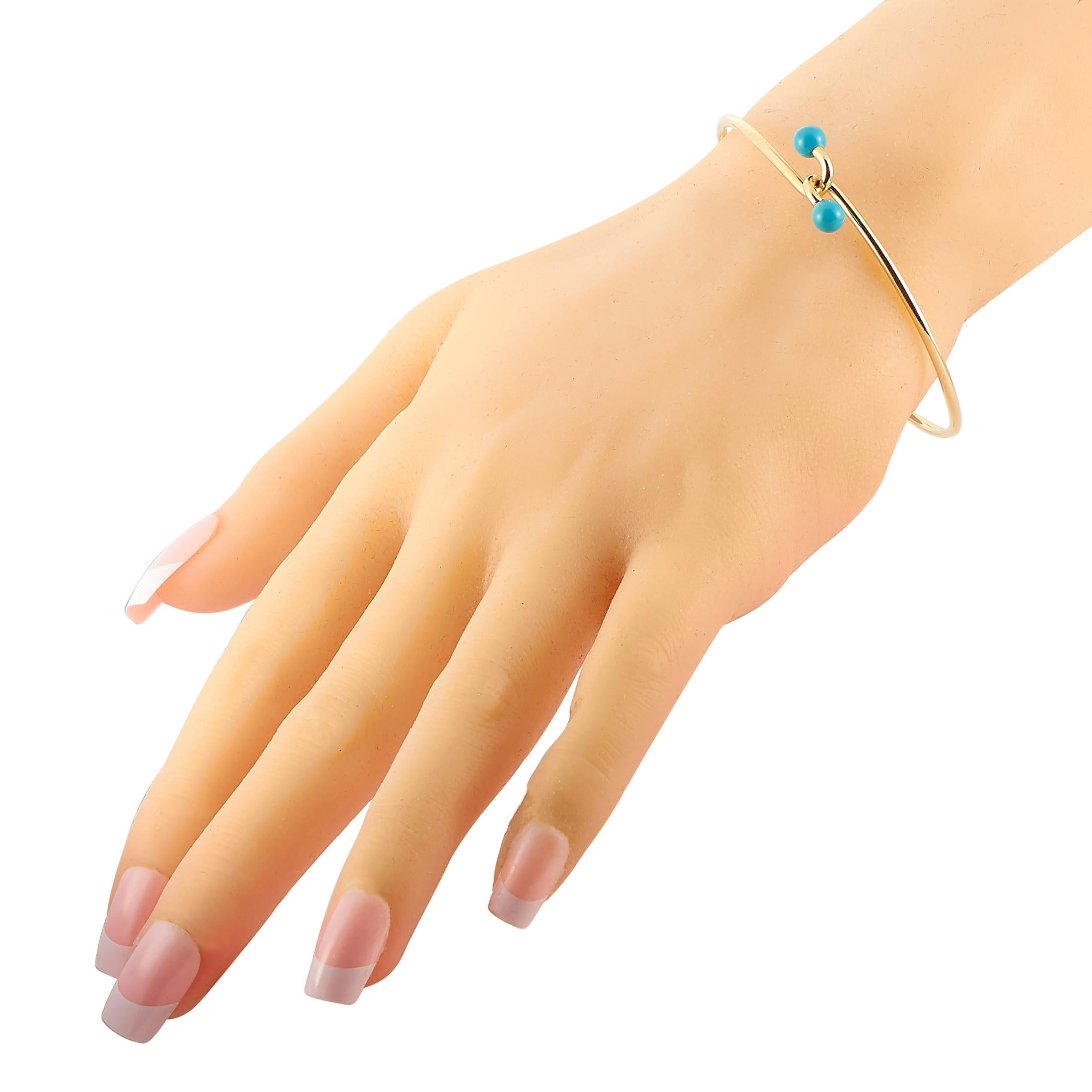 This Tiffany & Co. bracelet is made of 18K yellow gold and embellished with turquoises. The bracelet weighs 7.4 grams and measures 7.40” in length, boasting a 2.37” diameter.
 
 Offered in estate condition, this jewelry piece includes the